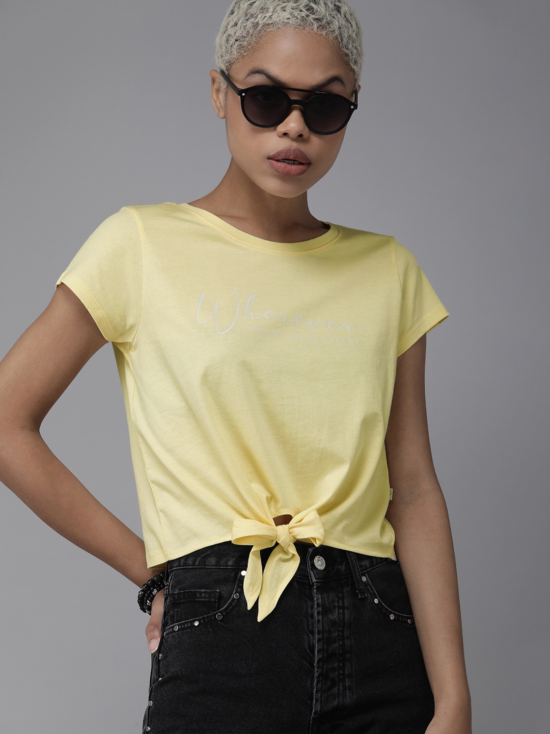 

The Roadster Lifestyle Co Women Yellow & Grey Typography Printed Waist Tie Up Pure Cotton T-shirt