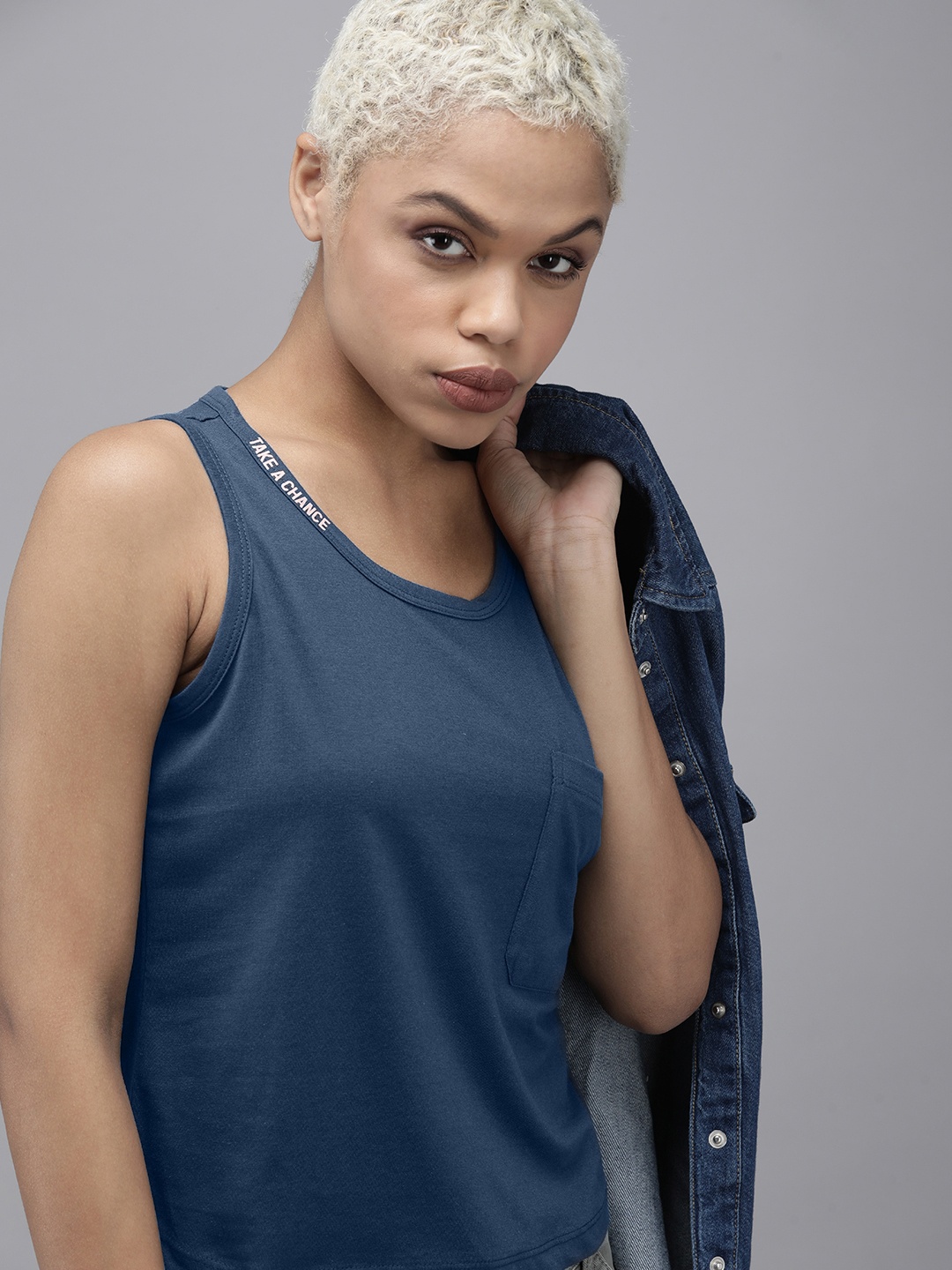 

Roadster Women Blue Typography Print Placement Sleeveless Casual T-shirt