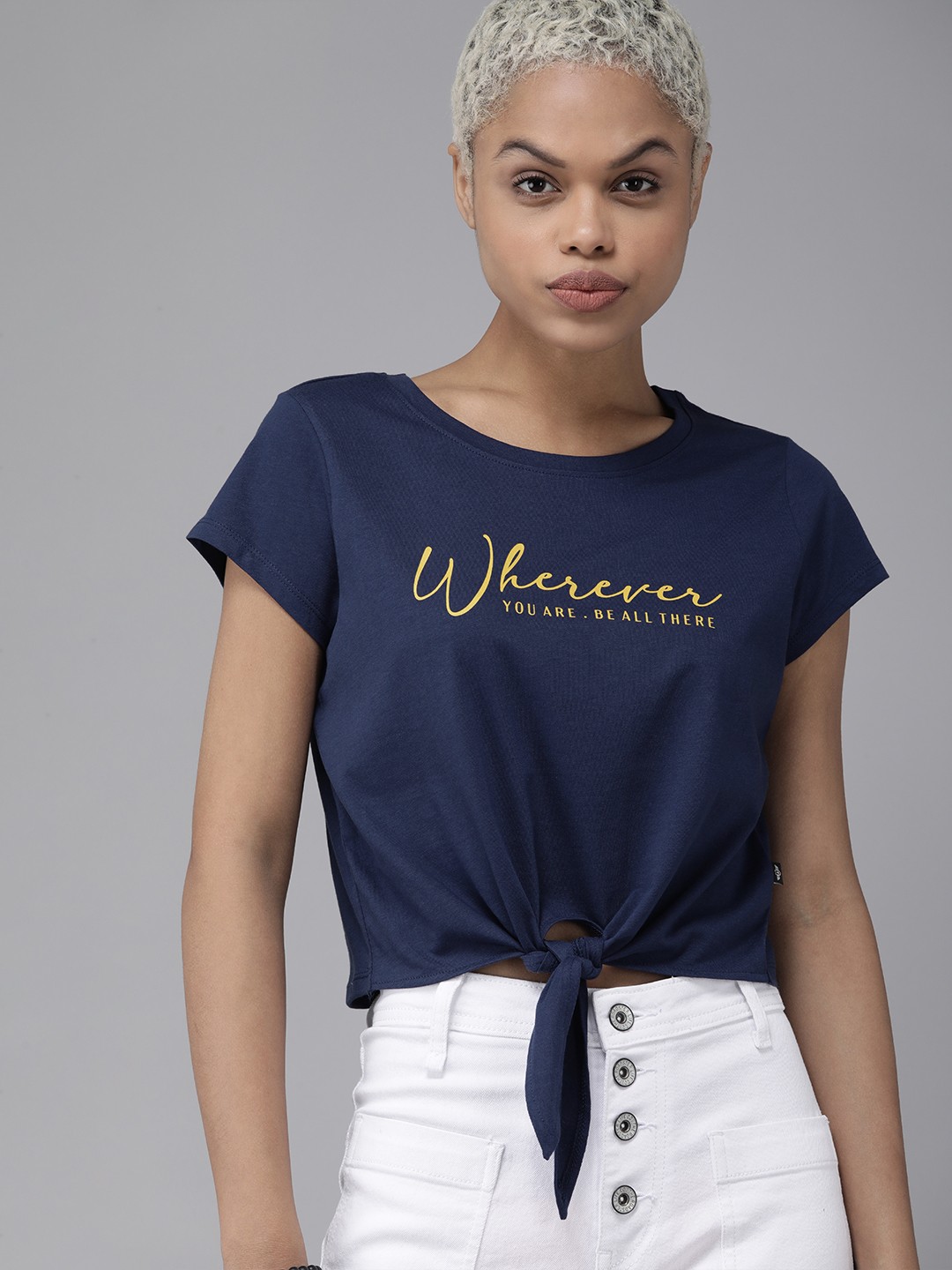 

The Roadster Lifestyle Co Women Blue & Yellow Typography Printed waist Tie Up Pure Cotton T-shirt