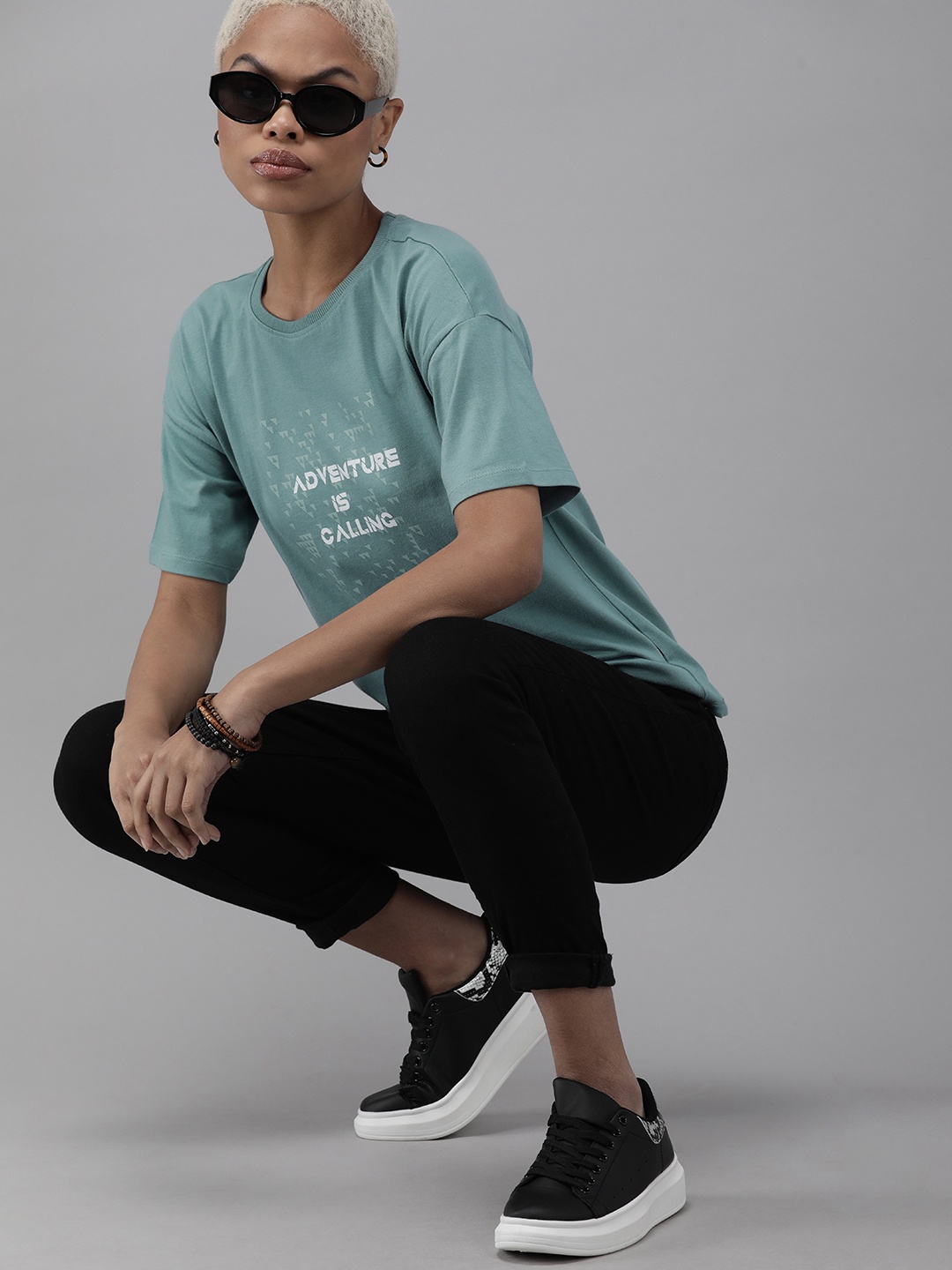 

The Roadster Lifestyle Co Women Blue Graphic Printed Extended Sleeves Pure Cotton T-shirt