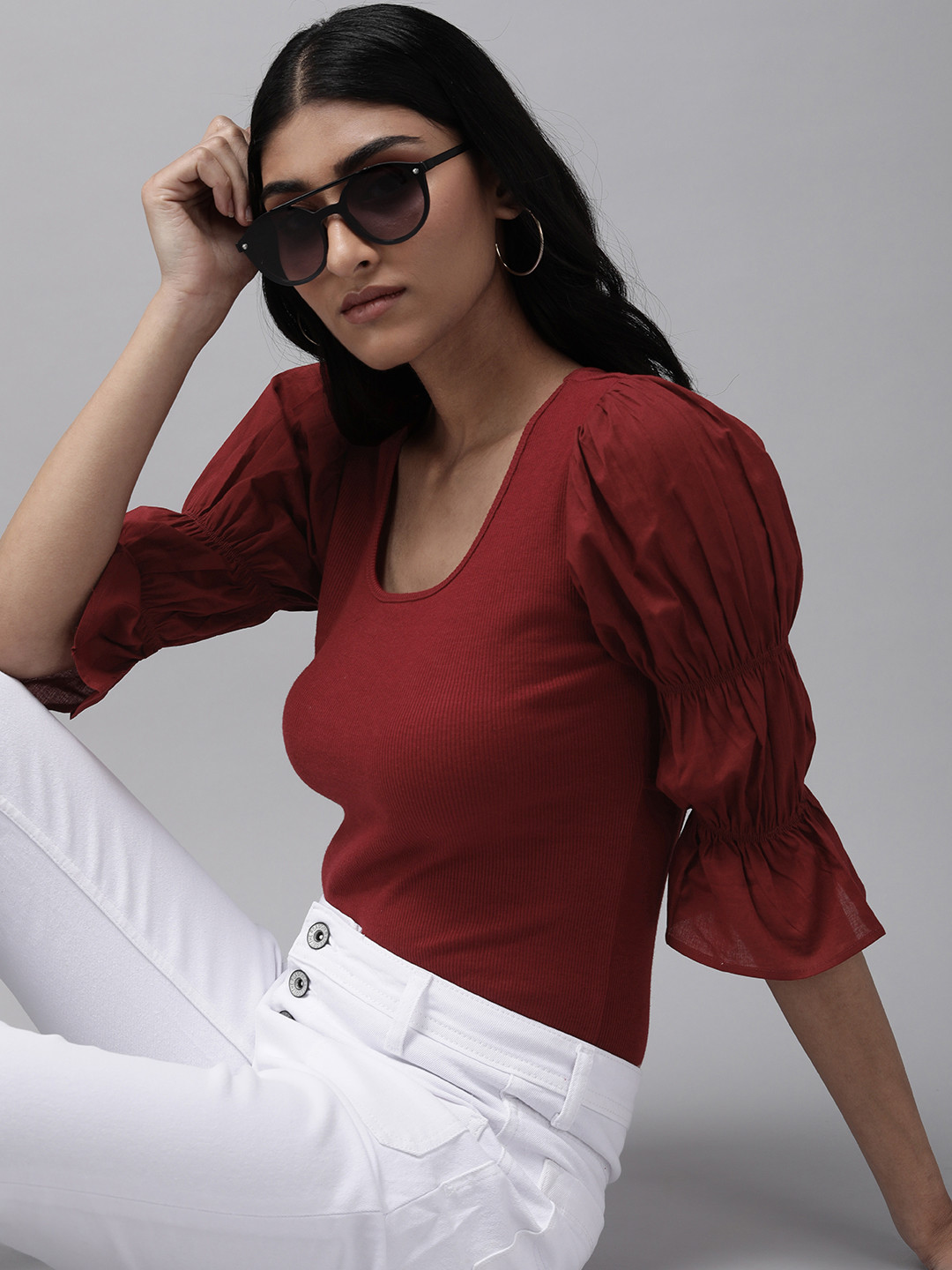 

The Roadster Lifestyle Co Maroon Solid Cut Out Detailed Regular Top