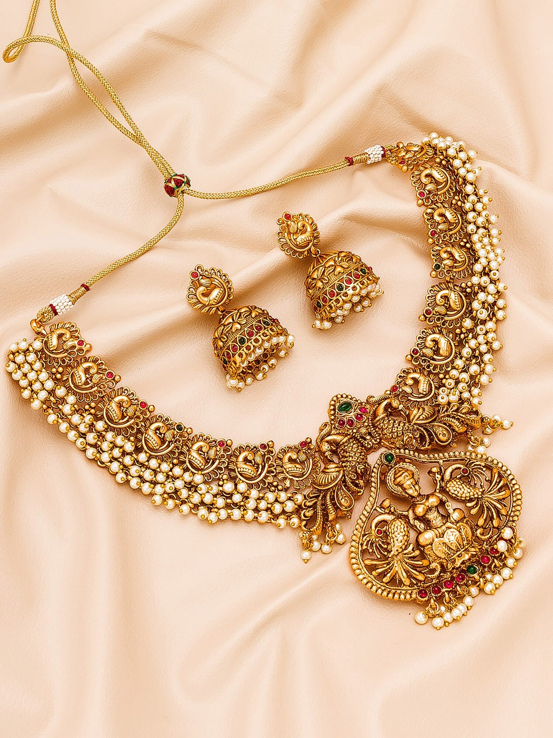 

aadita Woman Gold-Plated Green & Red Stone-Studded White Pearl Beaded Jewellery Set