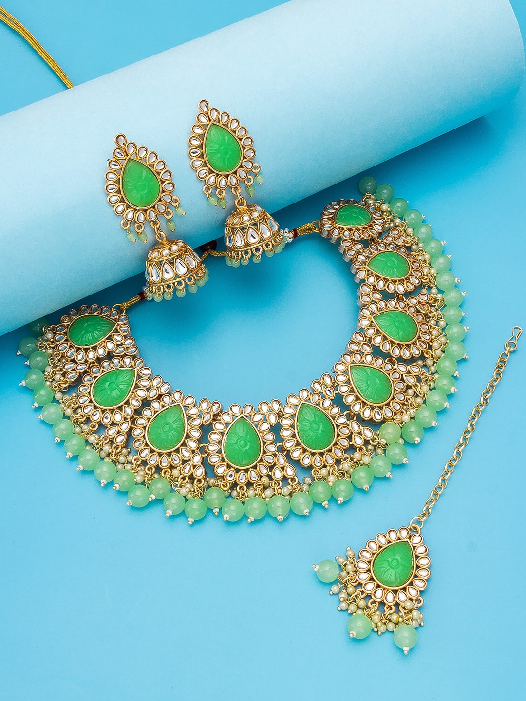 

aadita Gold-Plated & Green Stone-Studded & Pearl Beaded Jewellery Set