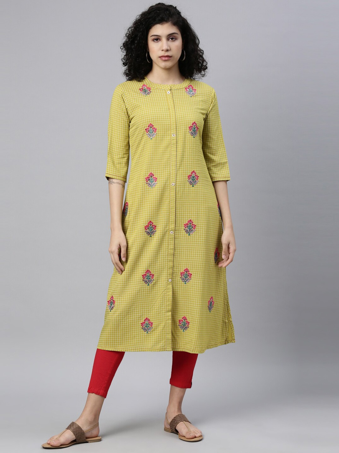 

Neerus Women Green Checked Thread Work Floral Kurta