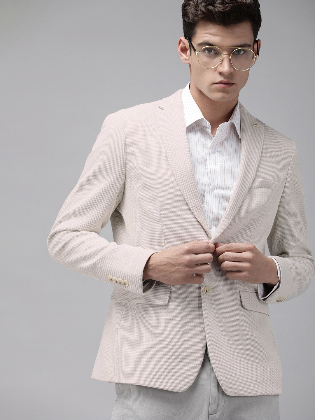 

Arrow Men Beige Self Design Slim Fit Single-Breasted Smart Casual Blazer
