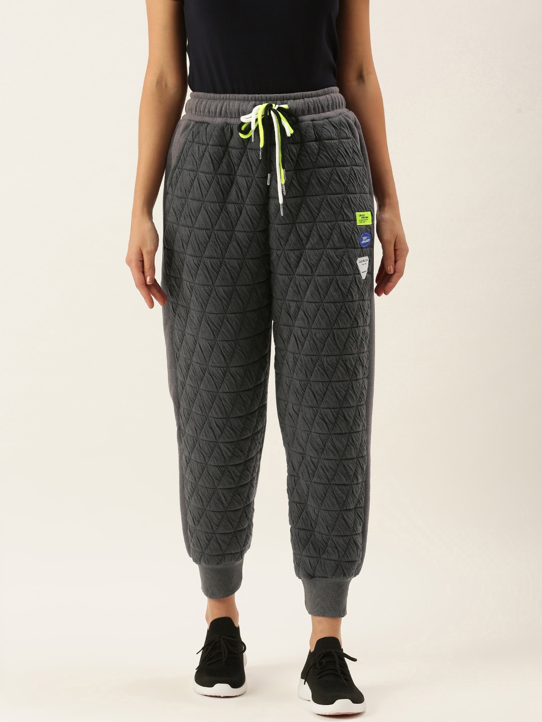 

SHECZZAR Women Charcoal Grey Solid Quilted Joggers with Applique Details