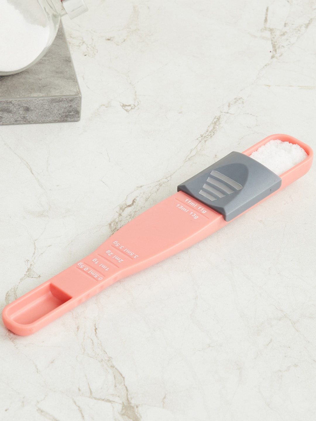 

Home Centre Peach Colored Rosemary-Sloan Adjustable Measuring Spoon
