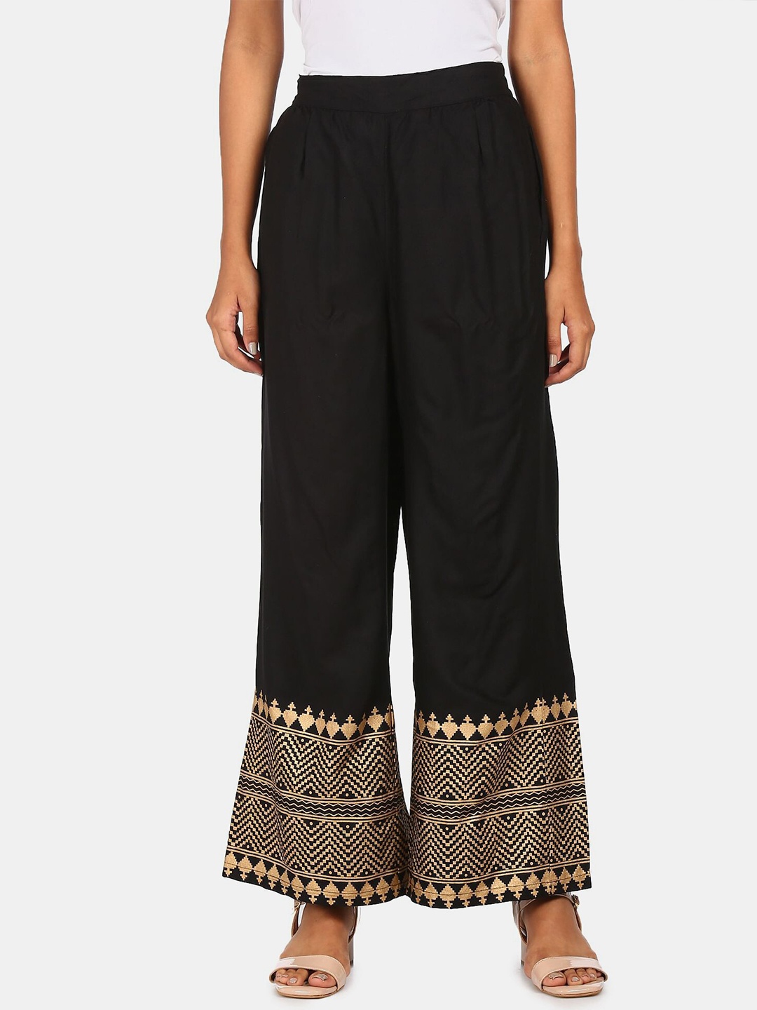 

Karigari Women Black & Gold-Toned Printed Flared Ethnic Palazzos