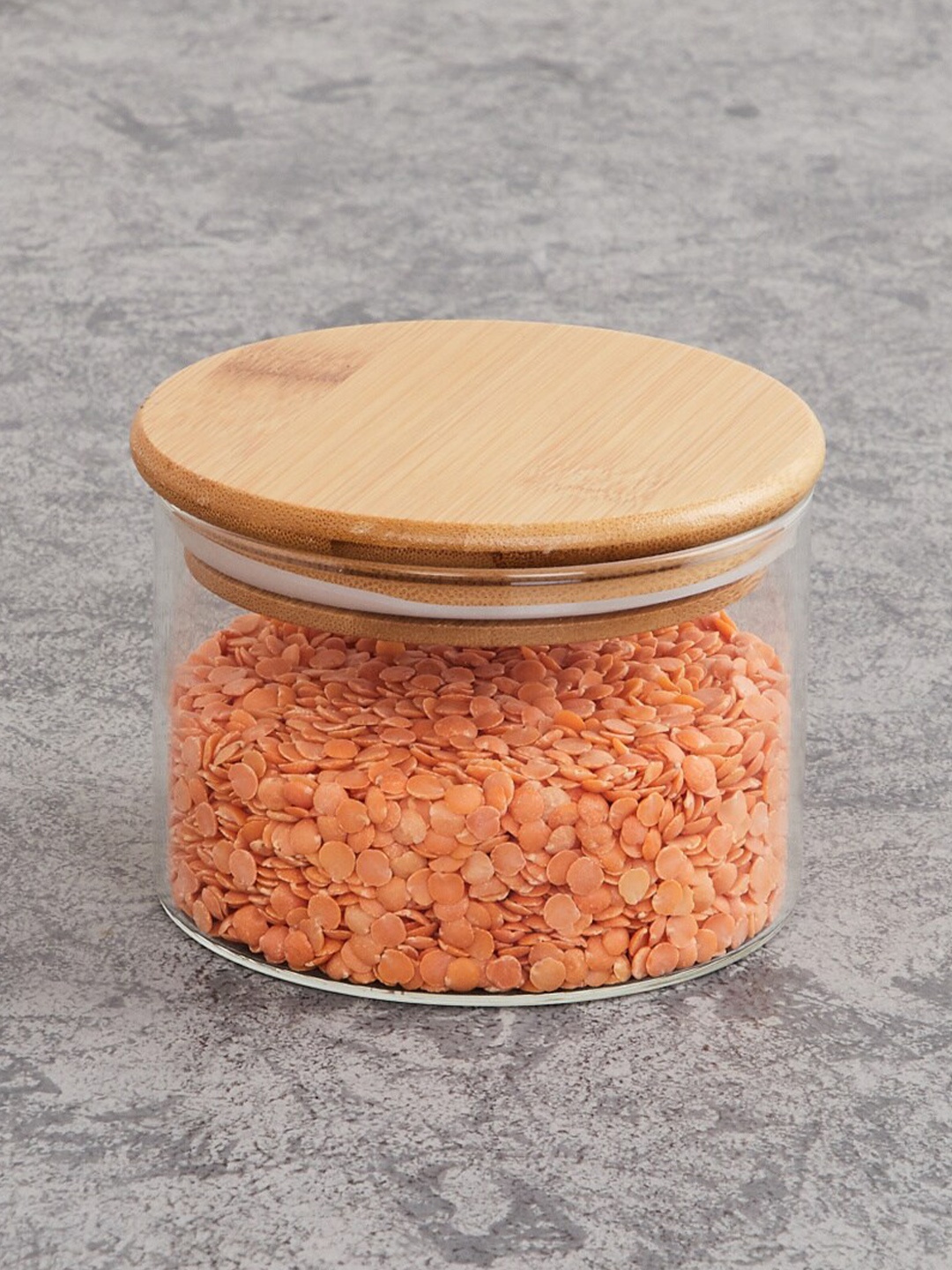 

Home Centre Transparent Solid Borosilicate Glass Jar With Bamboo Lid - 320ml