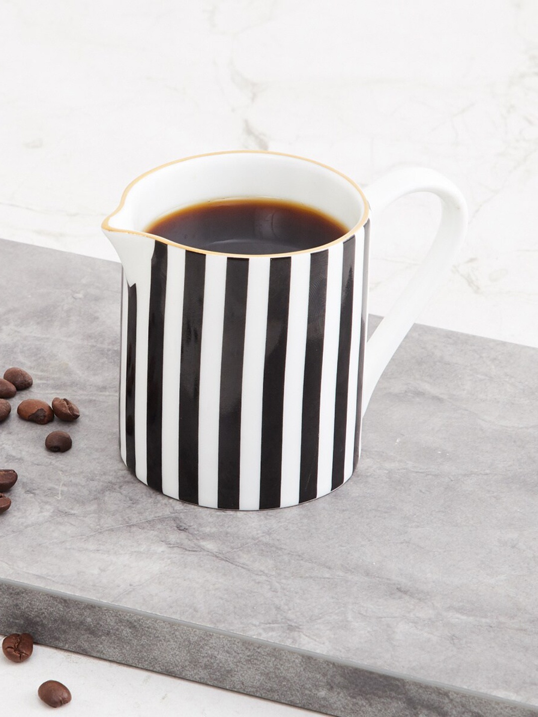 

Home Centre White & Black Printed Bone China Matte Mugs