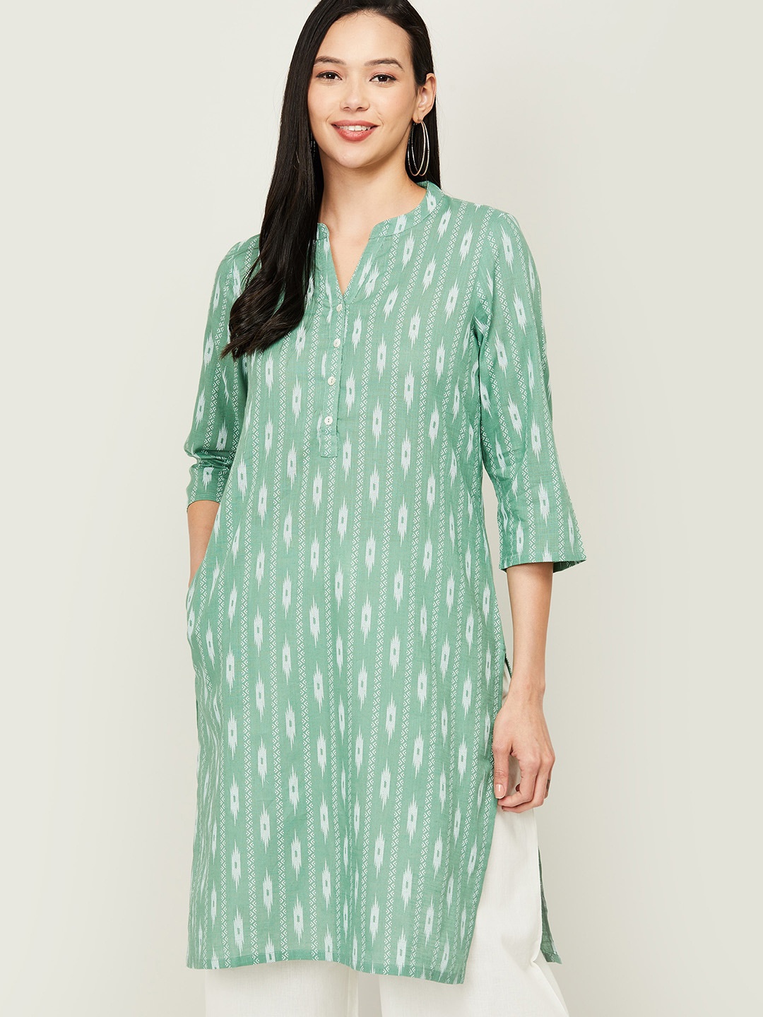 

Melange by Lifestyle Women Green Ikkat Print Pure Cotton Kurta