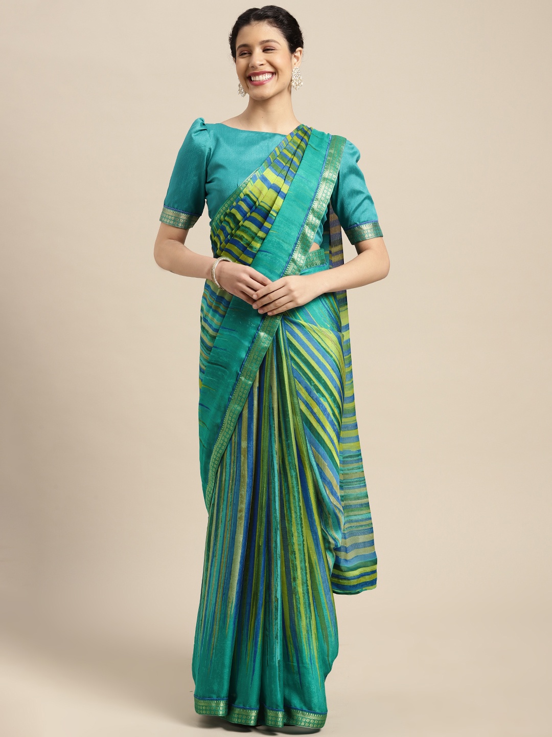 

Satrani Turquoise Blue & Green Leheriya Zari Pure Chiffon Saree