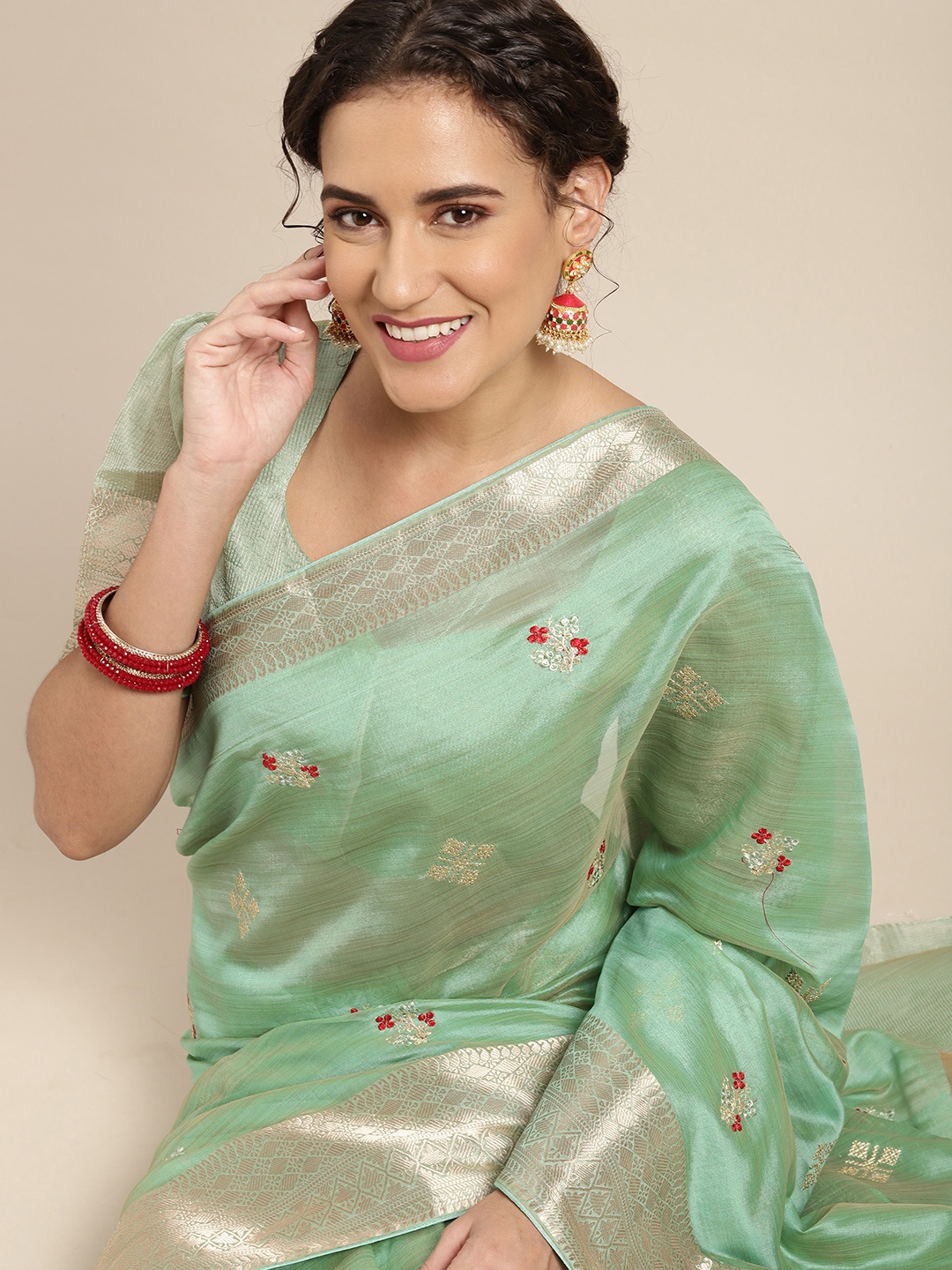 

Mitera Mint Green & Golden Ethnic Motifs Banarasi Saree