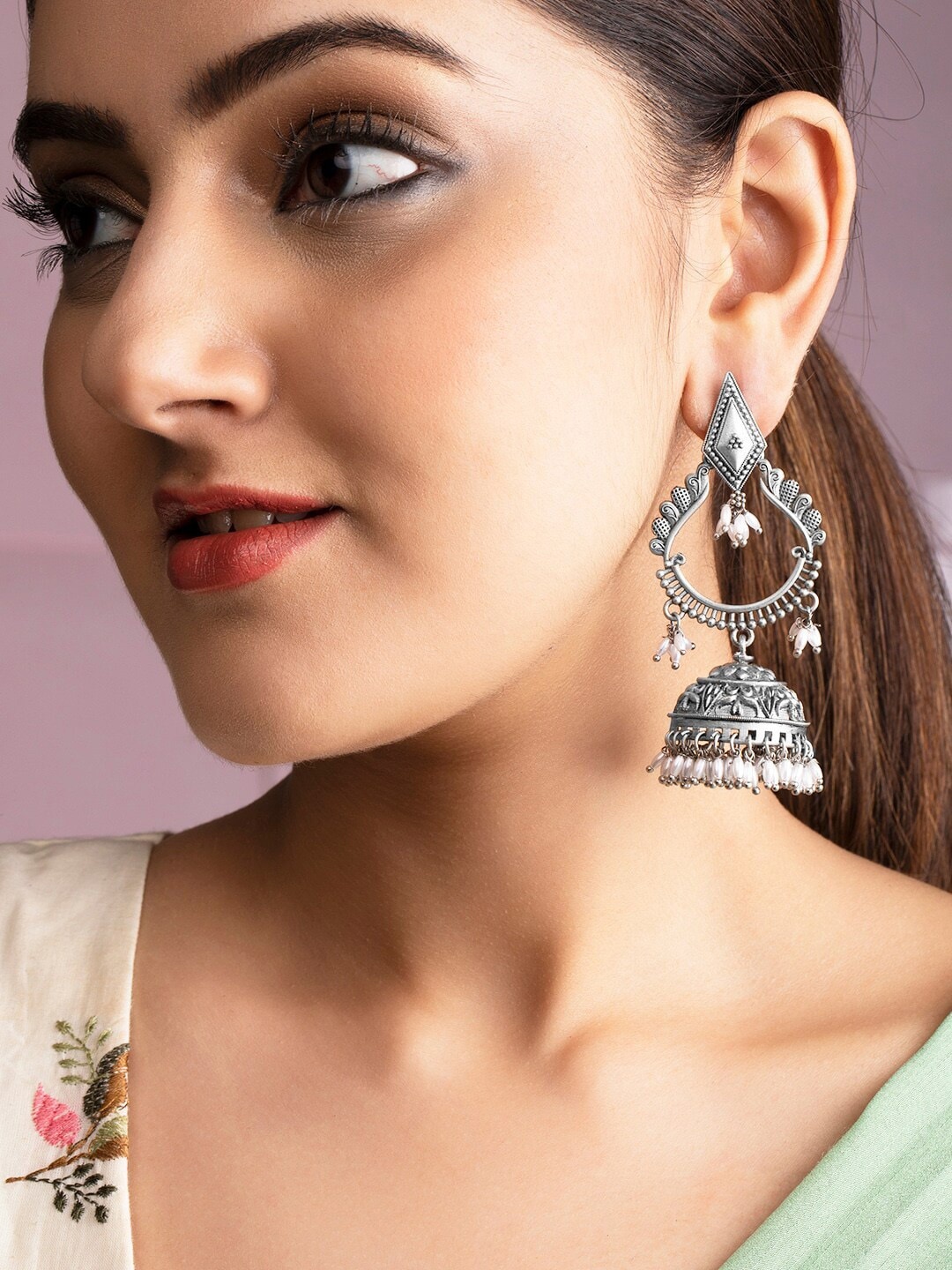 

Rubans Silver-Toned Dome Shaped Jhumkas Earrings