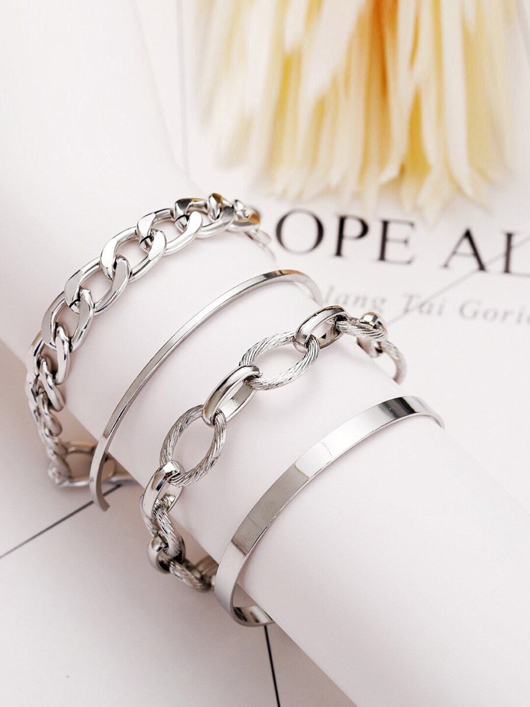 

Jewels Galaxy Women Silver-Toned Gold-Plated Set of 4 Wraparound Bracelet