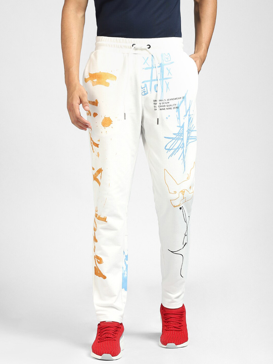 

Jack & Jones Men White & Yelllow Printed Slim Fit Track Pants