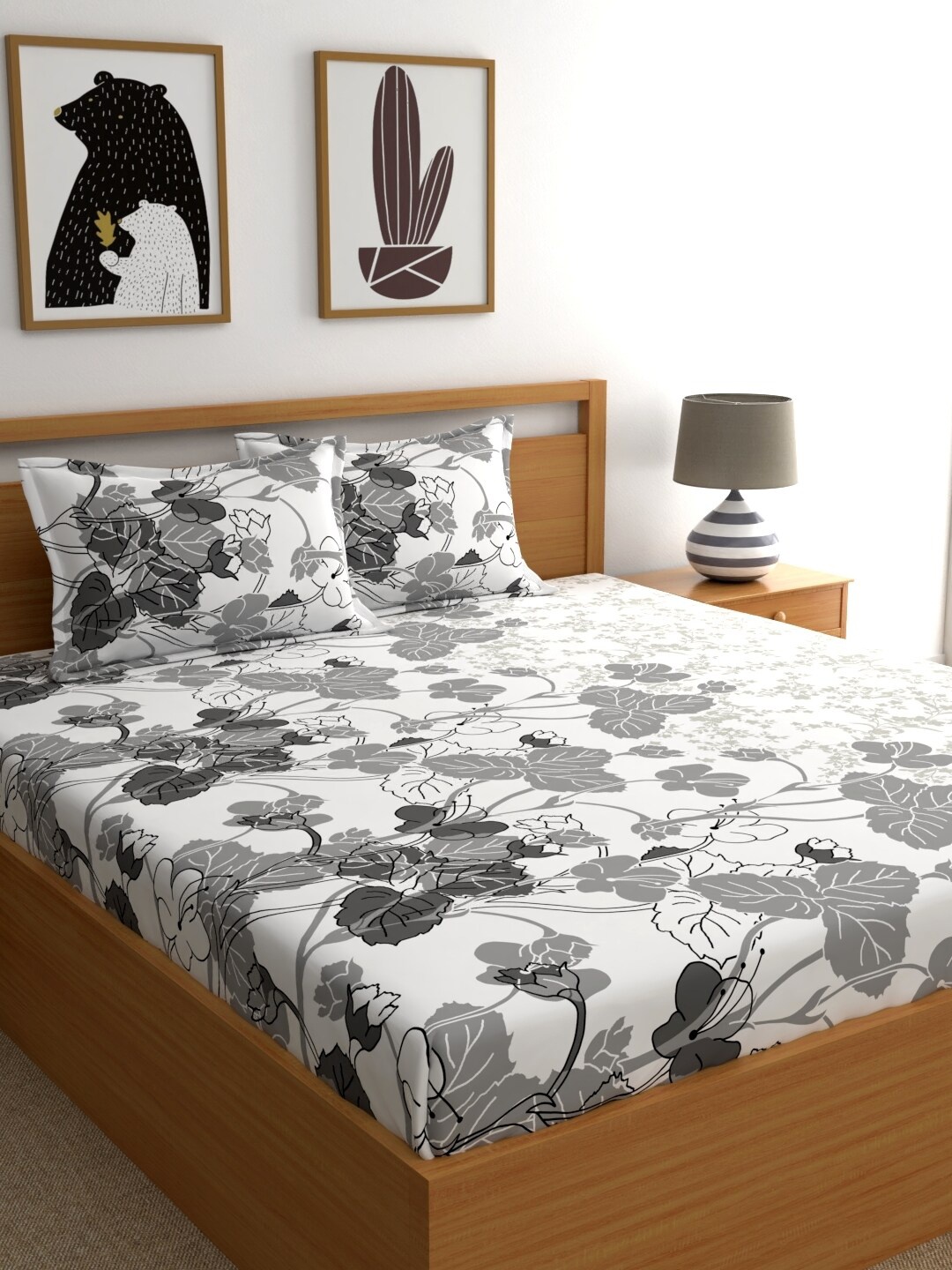 

Home Ecstasy Grey & White Floral 140 TC King Bedsheet with 2 Pillow Covers