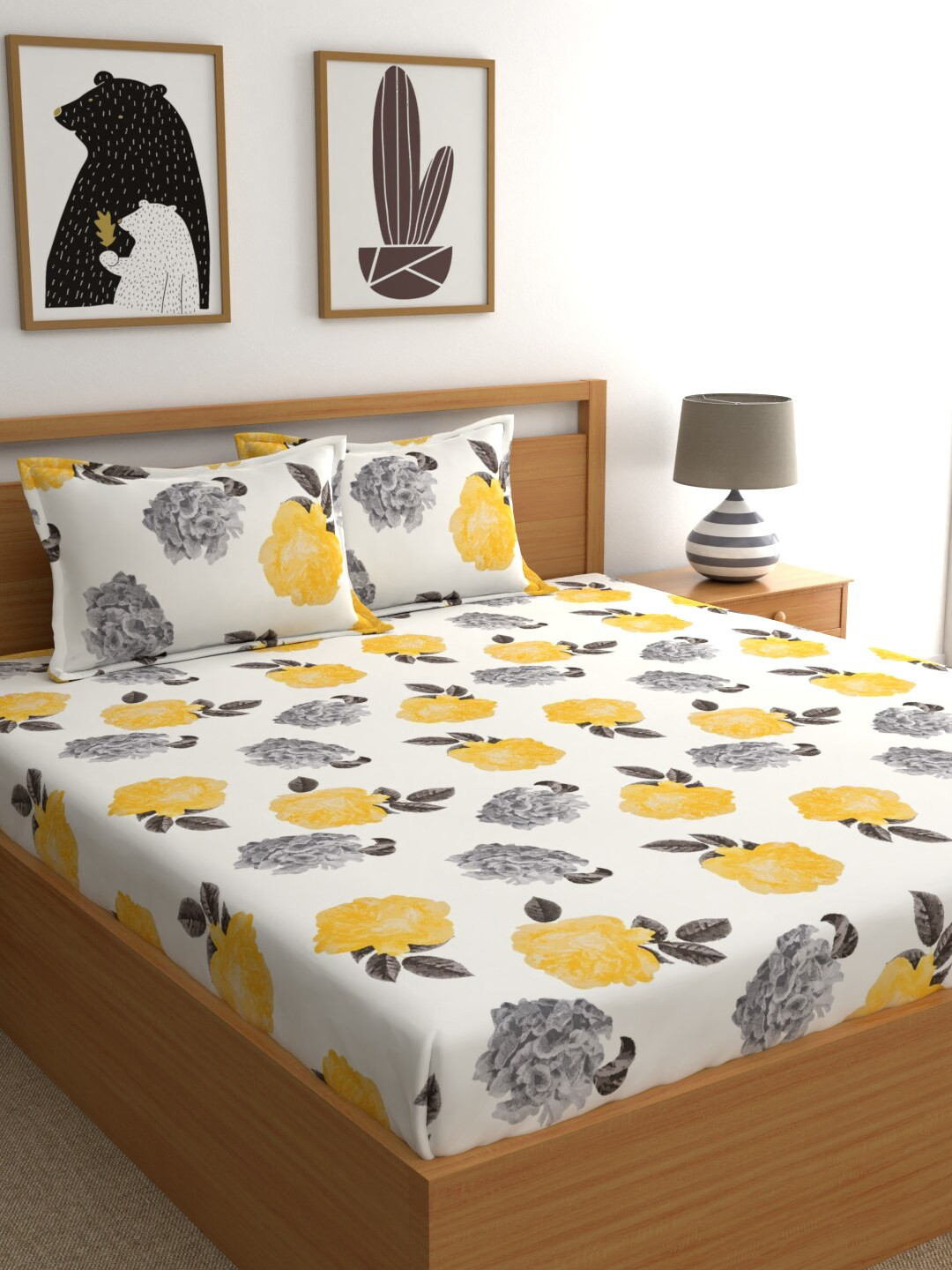 

Home Ecstasy White & Yellow Floral 140 TC King Bedsheet with 2 Pillow Covers
