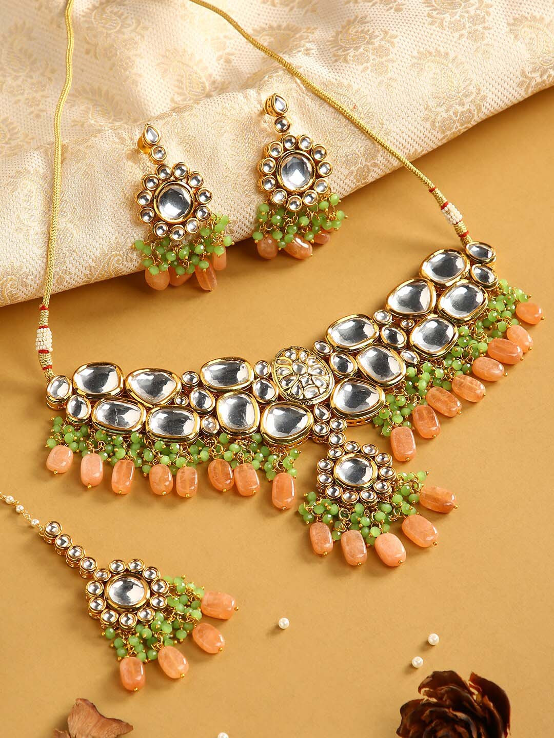 

justpeachy Gold-Toned & Peach Kundan Stone Studded Jewellery Set