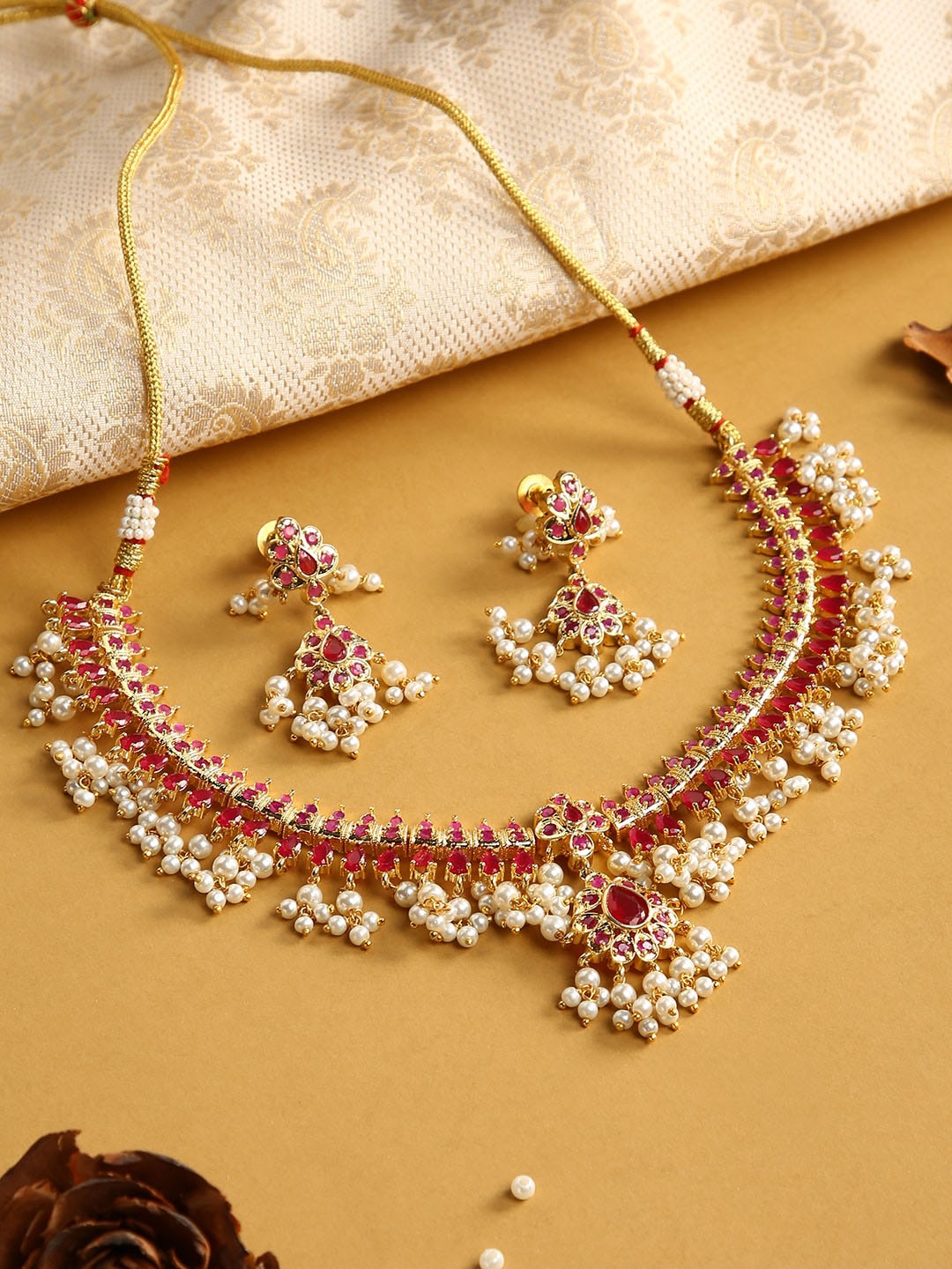 

justpeachy Gold-Toned & Red Stone Studded & Beaded Jewellery Set