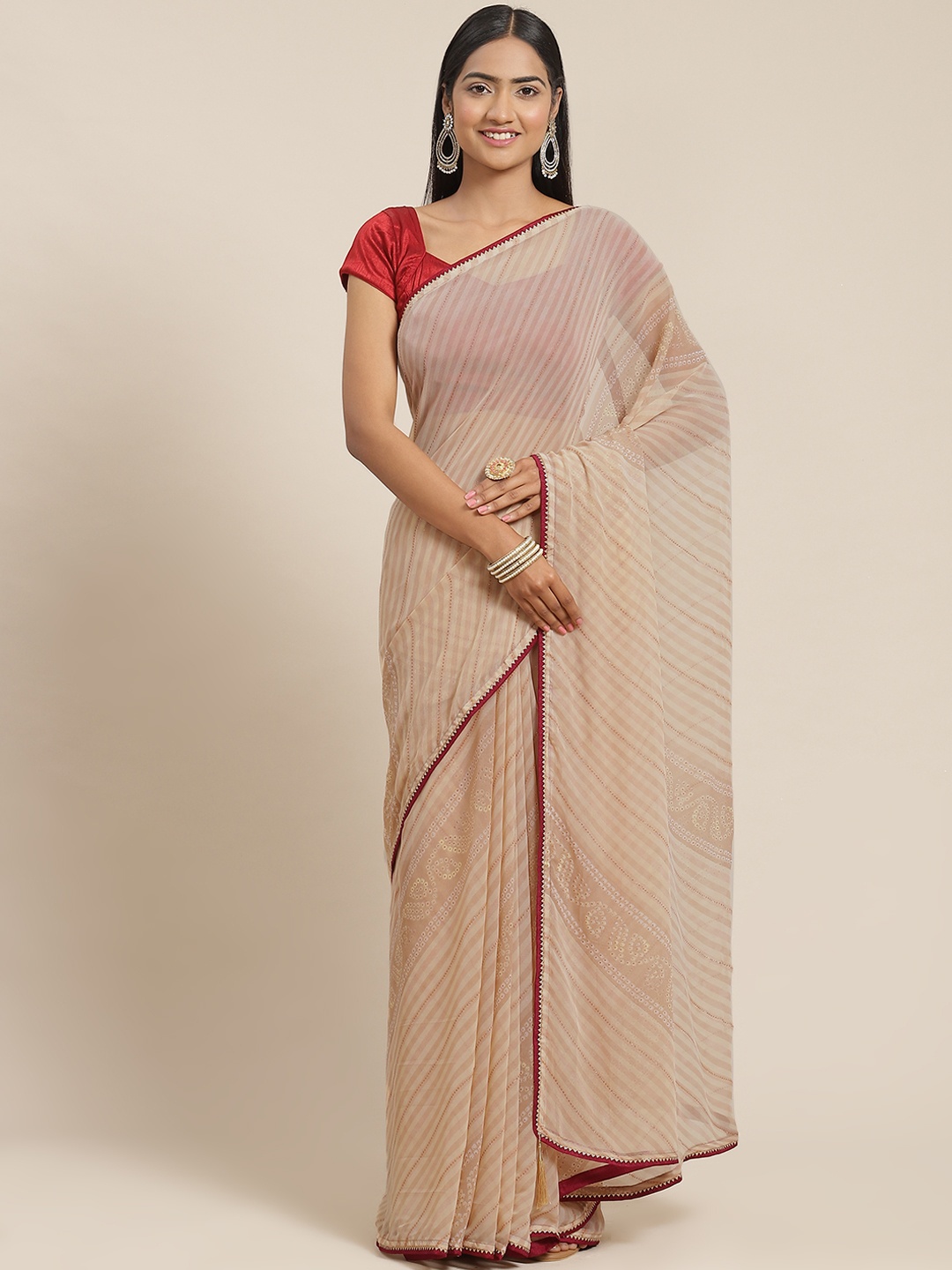 

Triveni Beige Embellished Gotta Patti Pure Georgette Leheriya Saree