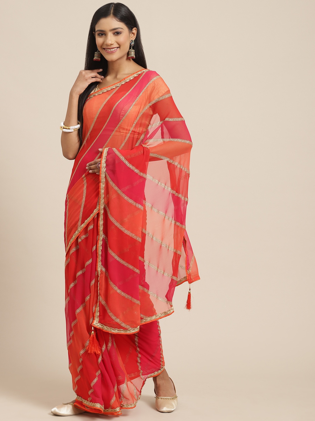 

Triveni Red & Gold-Toned Embellished Gotta Patti Pure Georgette Leheriya Saree