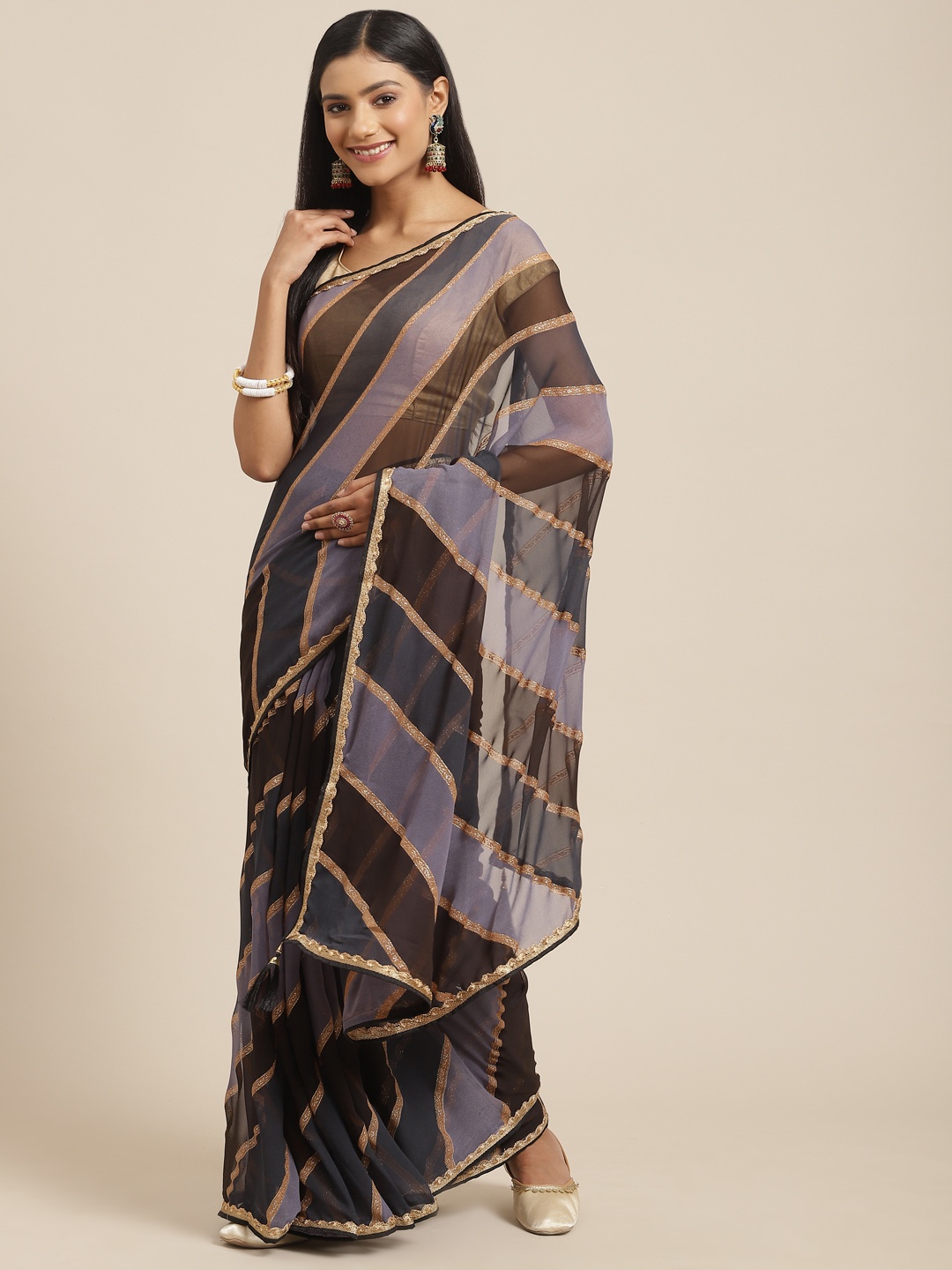 

Triveni Black & Brown Striped Gotta Patti Embellished Pure Georgette Leheriya Saree