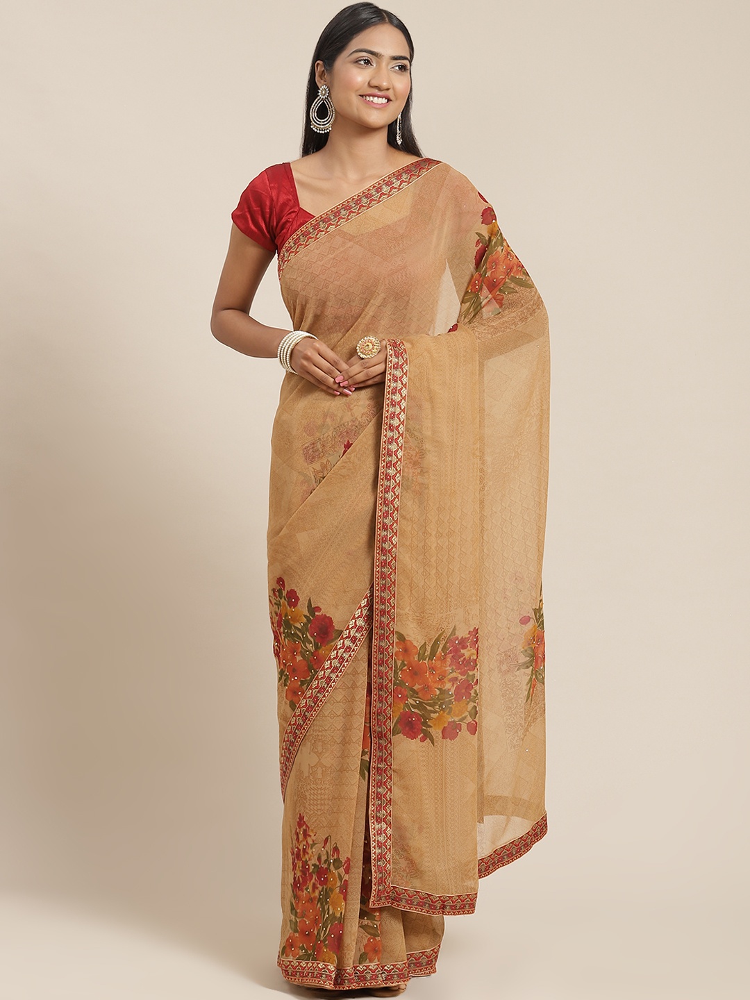 

Triveni Beige & Red Printed Beads and Stones Embellished Pure Georgette Saree