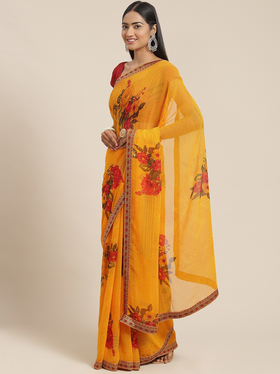 

Triveni Yellow & Red Beads and Stones Embellished Pure Georgette Saree
