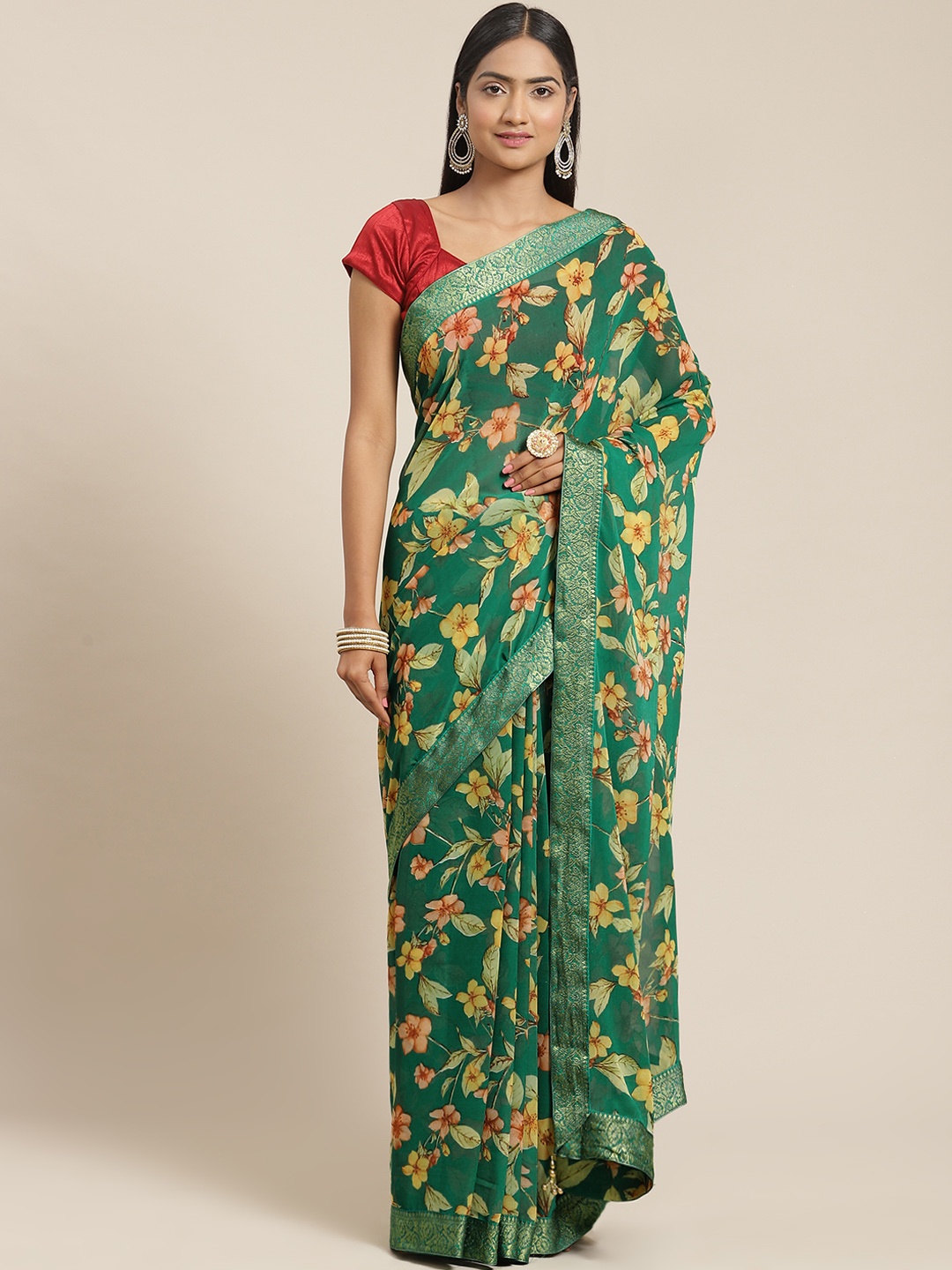 

Triveni Green Floral Pure Georgette Saree
