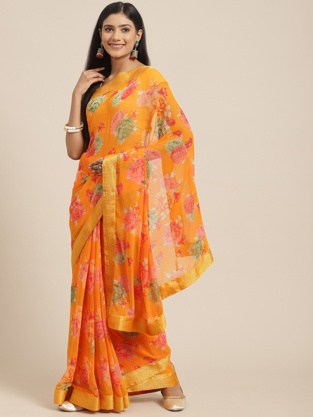 

Triveni Orange & Pink Floral Pure Georgette Saree