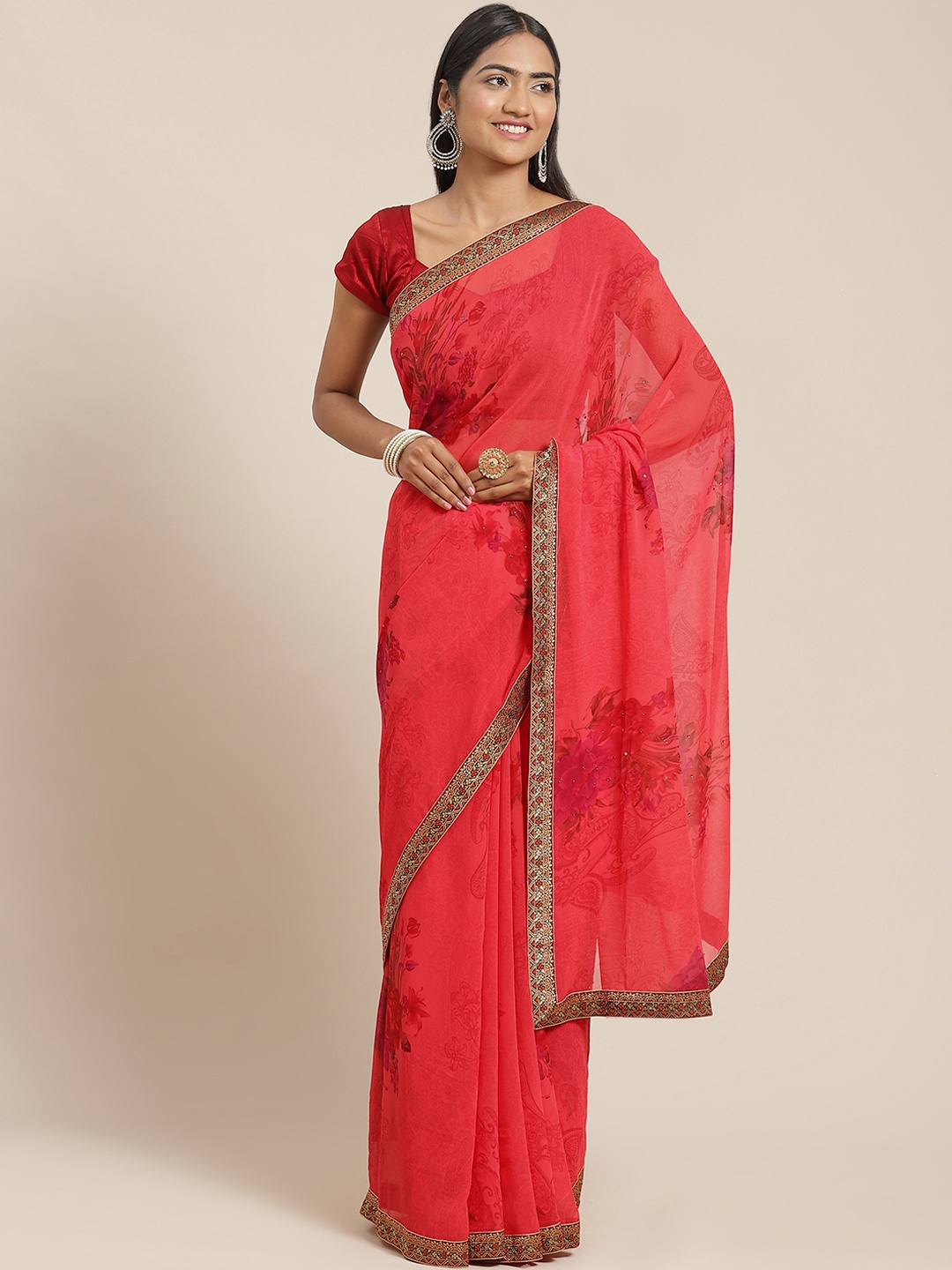 

Triveni Pink Embellished Beads and Stones Pure Georgette Saree