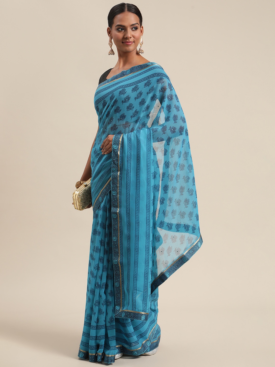 

Triveni Blue Floral Pure Chiffon Saree