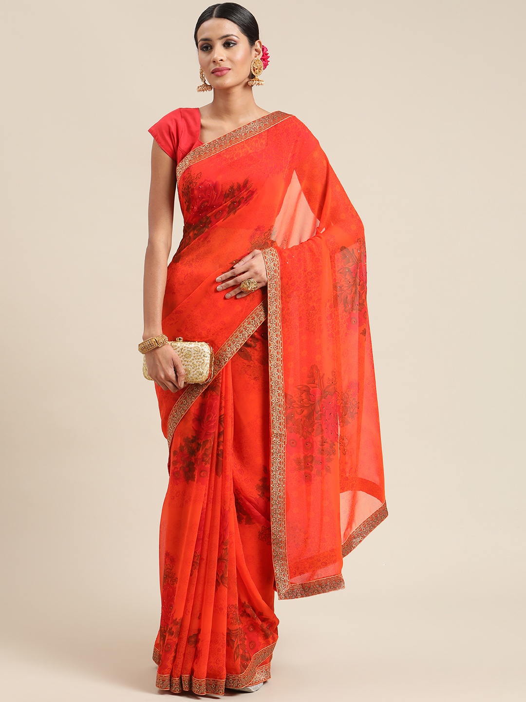

Triveni Red Floral Zari Pure Georgette Saree