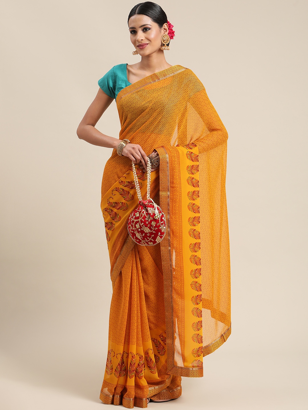 

Triveni Mustard Ethnic Motifs Zari Pure Georgette Saree