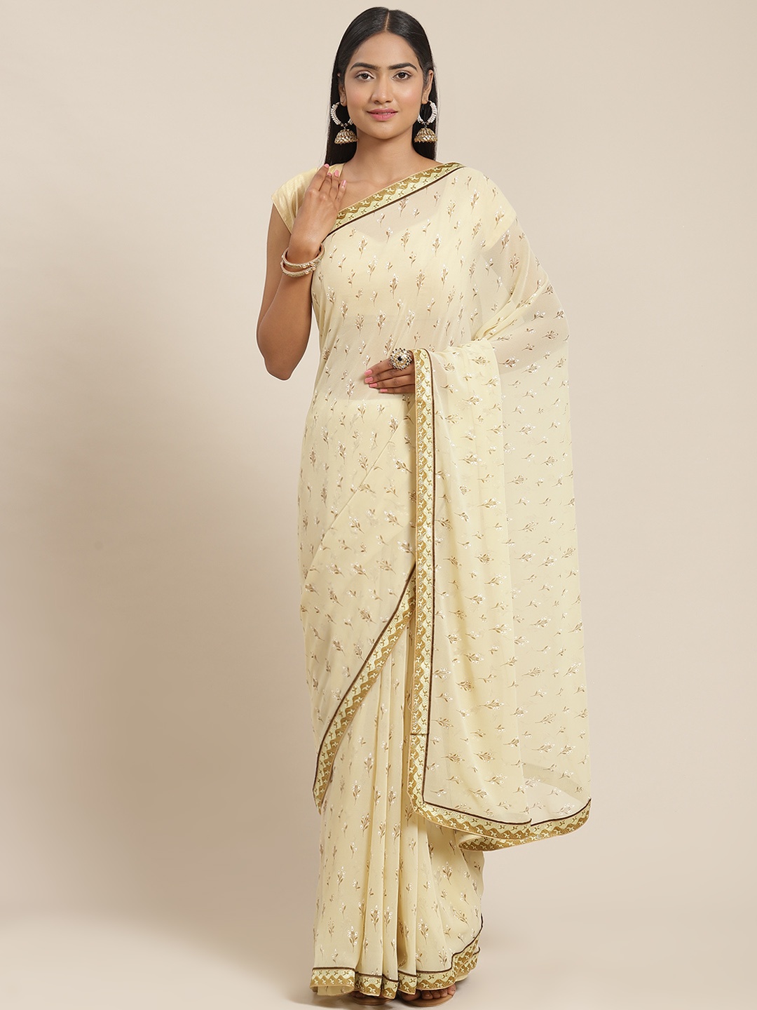 

Triveni Beige Floral Printed Pure Georgette Saree