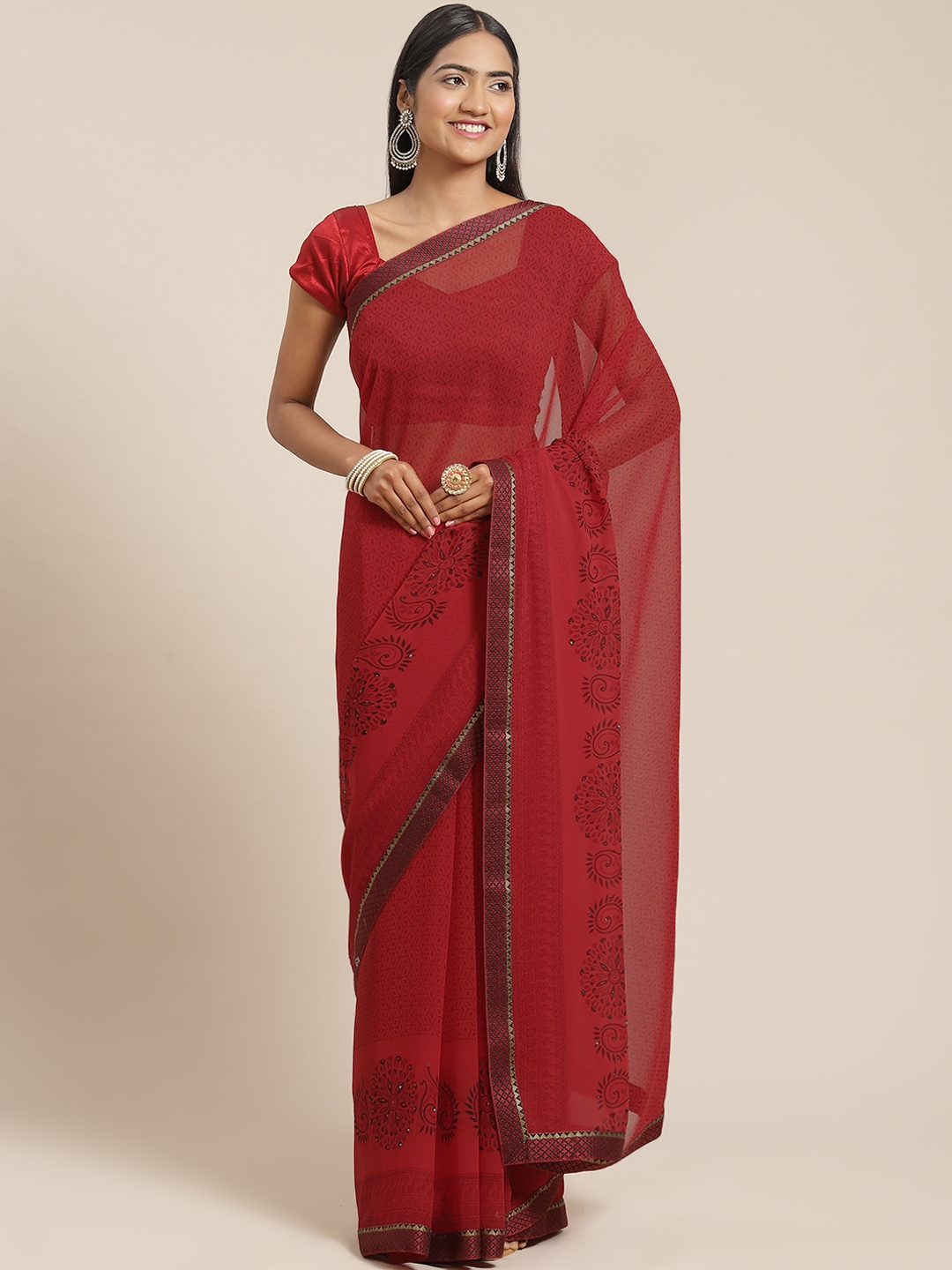 

Triveni Red Zari Pure Georgette Saree