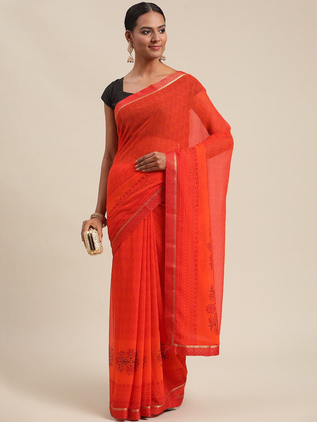 

Triveni Orange Pure Georgette Saree