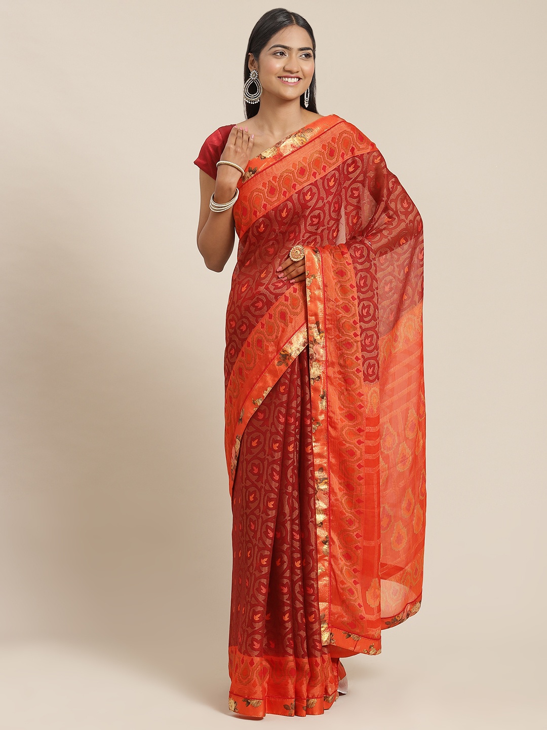 

Triveni Red Floral Pure Georgette Saree
