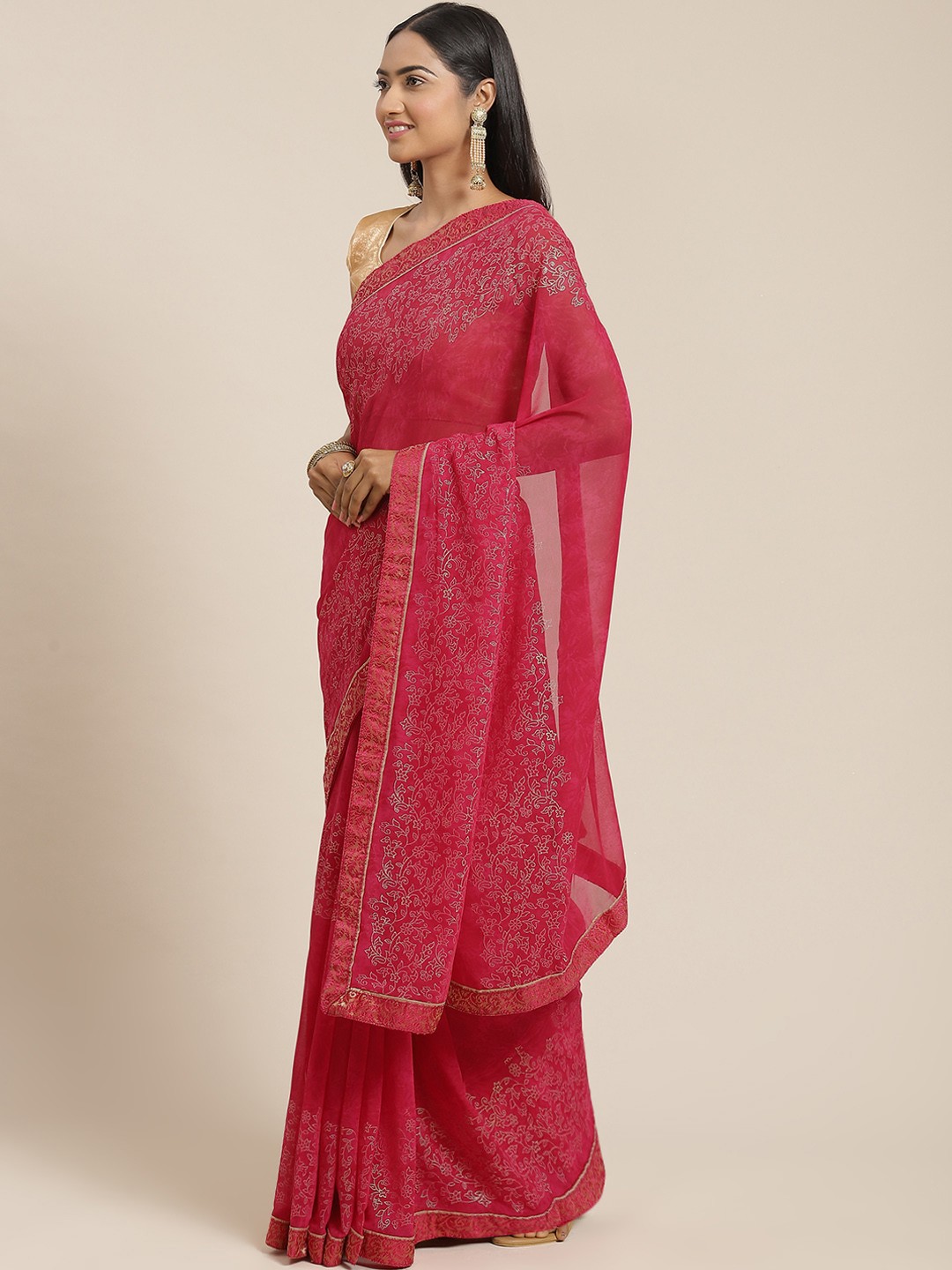 

Triveni Pink Floral Zari Pure Georgette Saree