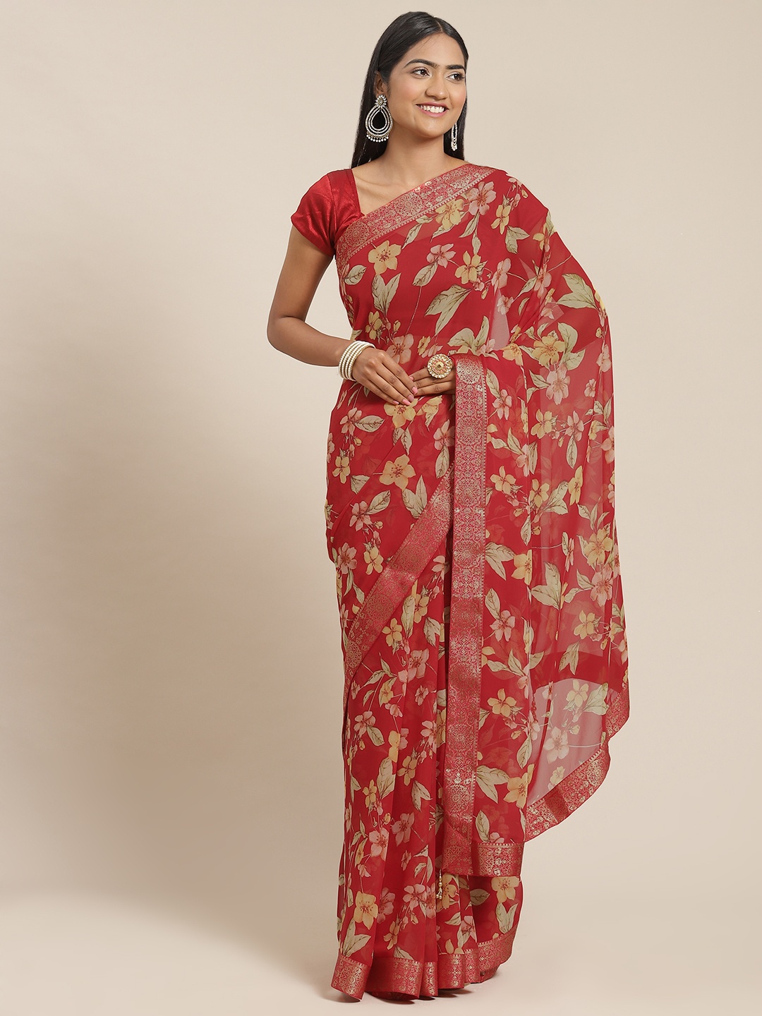 

Triveni Maroon Zari Brasso Saree