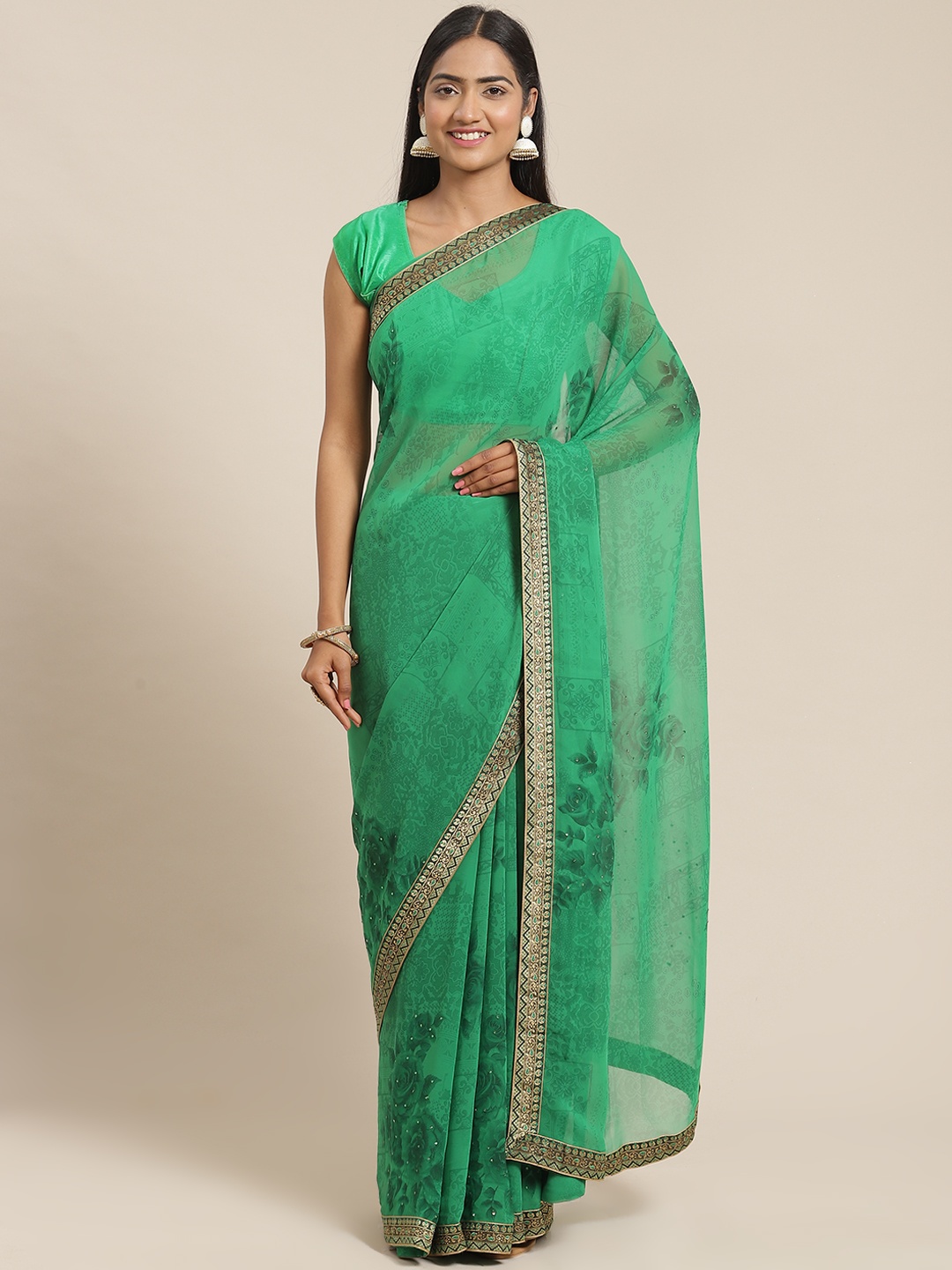 

Triveni Green Printed Beads and Stones Embellished Pure Georgette Saree
