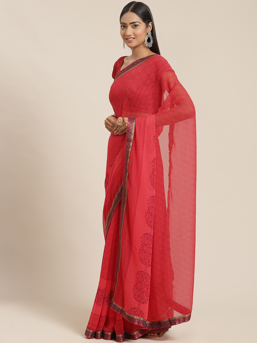 

Triveni Pink Printed Zari Pure Georgette Saree