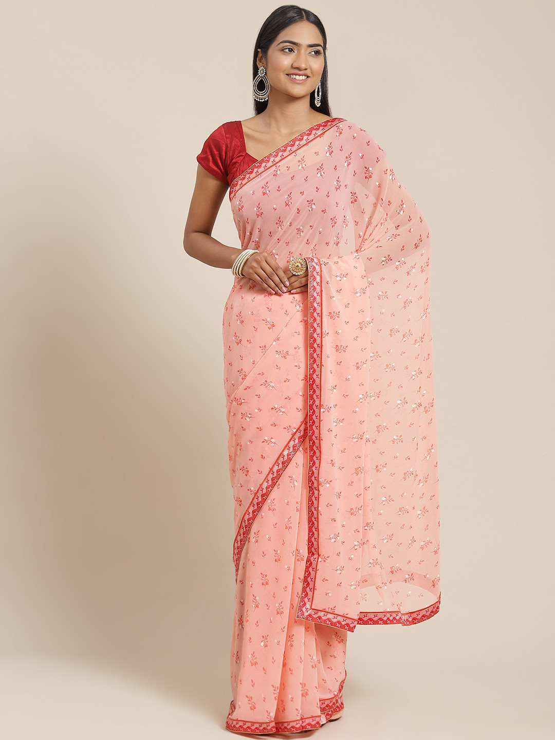 

Triveni Pink & White Floral Printed Pure Georgette Saree