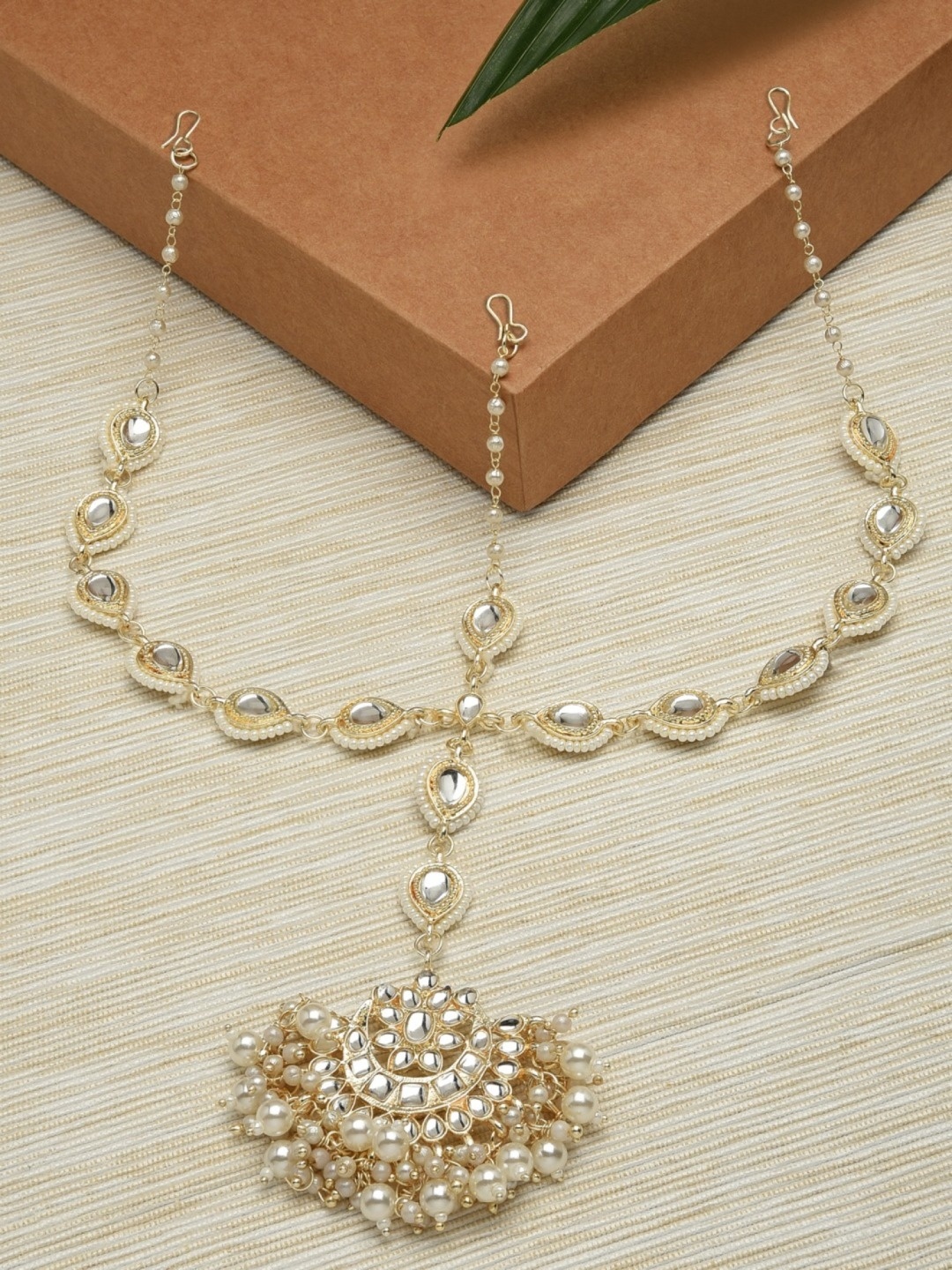 

Zaveri Pearls Gold-Plated & White Kundan-Studded & Pearl Beaded Jewellery Set
