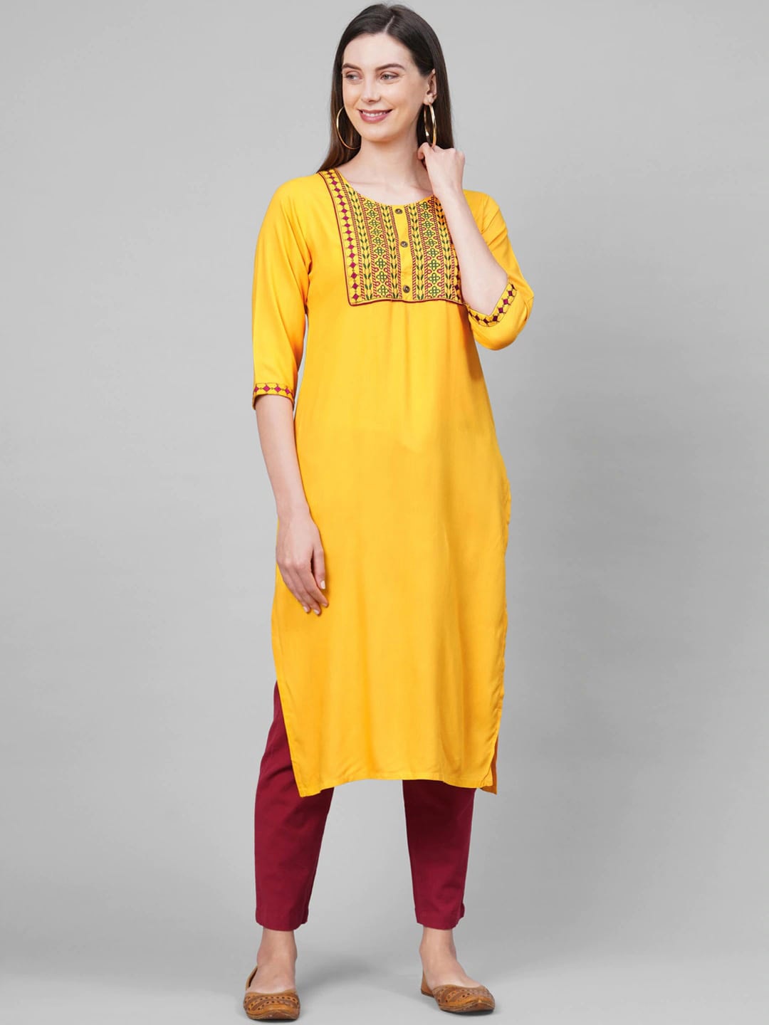 

GoSriKi Women Yellow Ethnic Motifs Yoke Design Thread Work Kurta