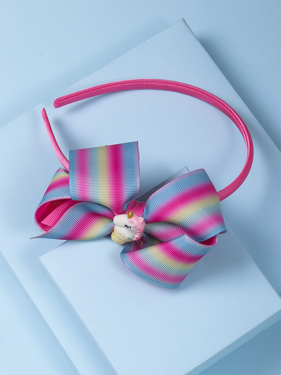 

Arendelle Grosgrain Ribbon Bow Dark Pink Hair Band with Unicorn Charm