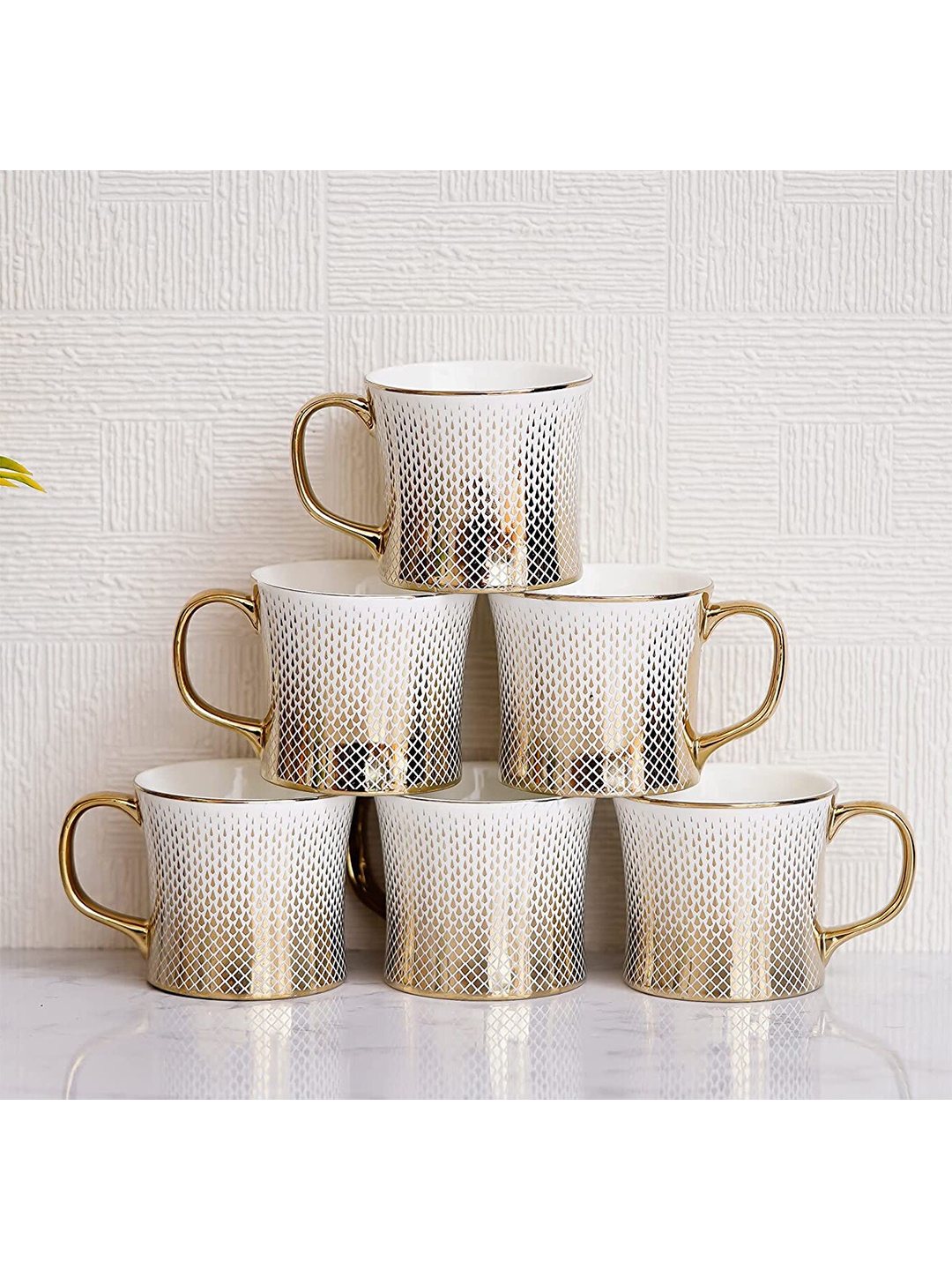 

Femora Set-6 White & Gold-Toned Printed Bone China Glossy Cups and Mugs