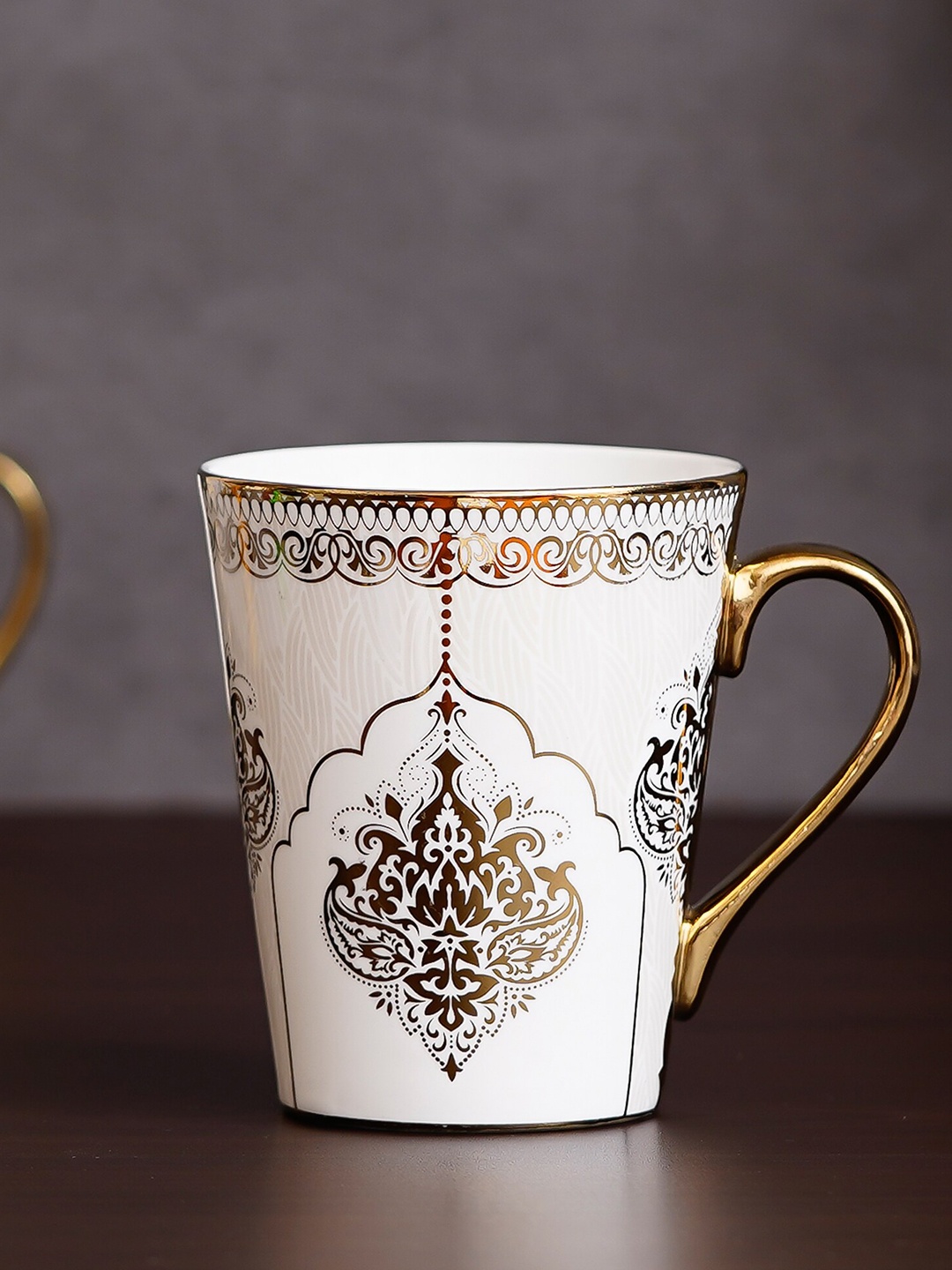 

Femora White & Gold-Toned Printed Bone China Glossy Cups