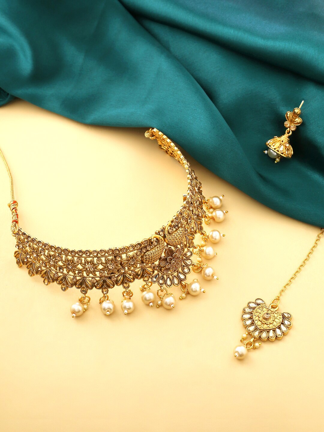 

Yellow Chimes Gold-Plated Beige Stone-Studded Oxidised Jewellery Set